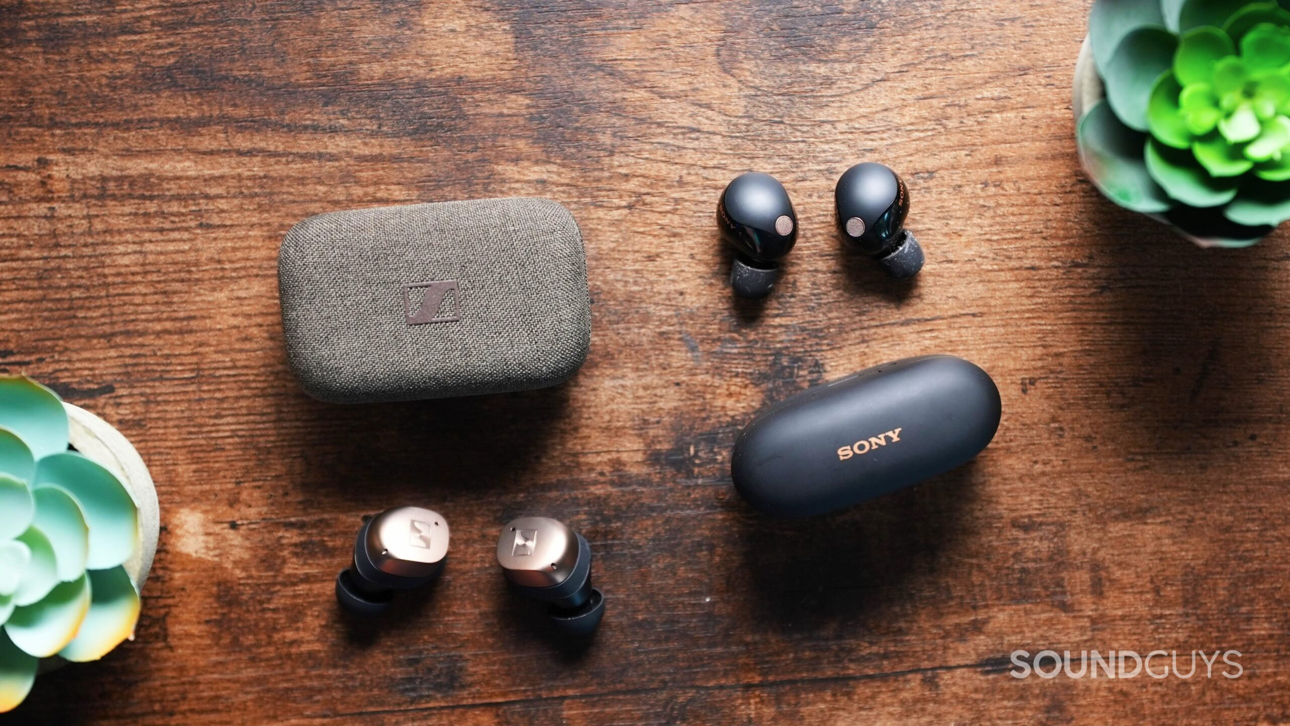 Sennheiser Momentum True Wireless 4 earbuds beside the Sony WF-1000XM5 earbuds outside of case