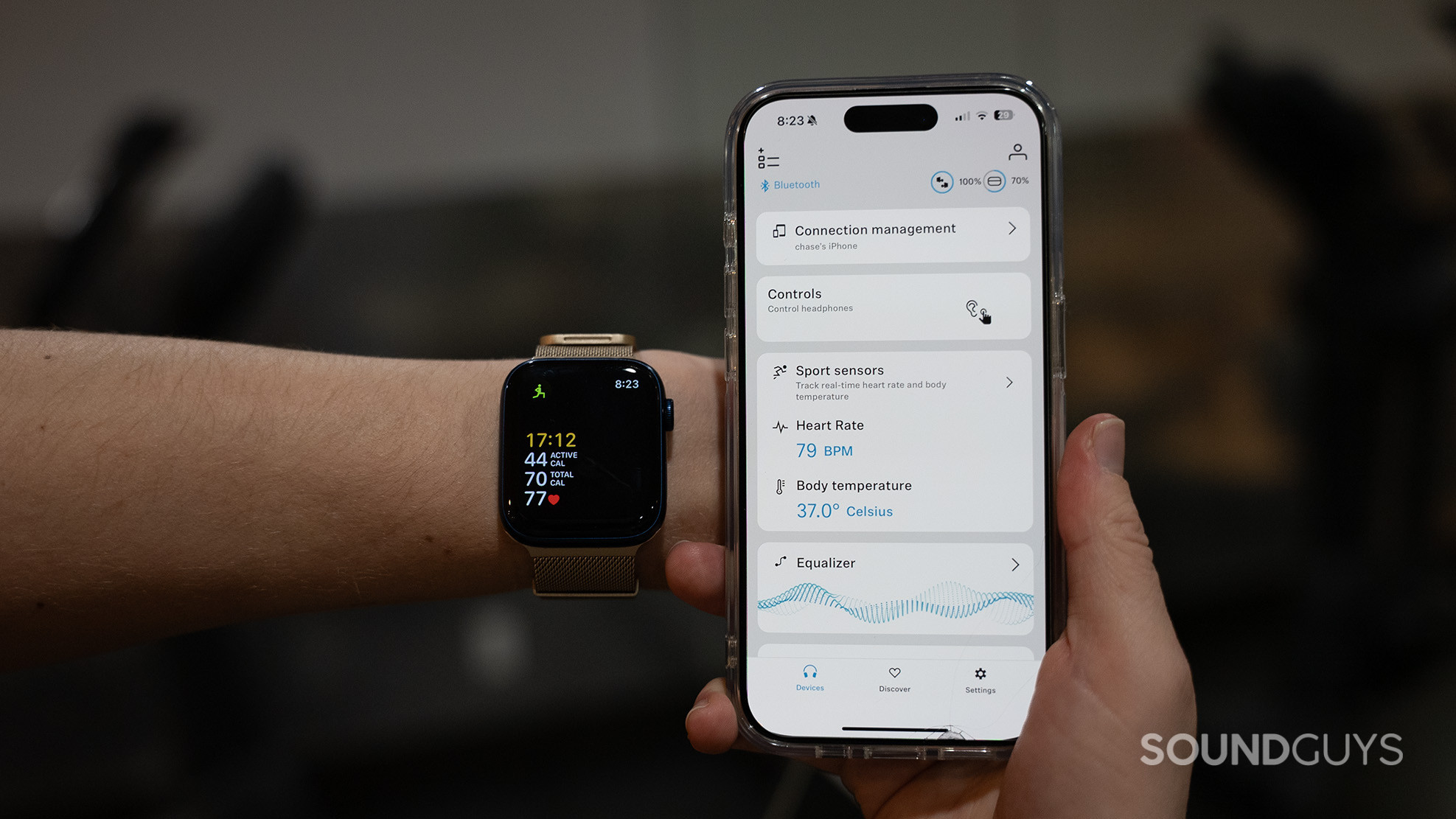 The Sennheiser Smart Control app showing a heart rate reading of 79 bpm next to an Apple Watch showing a reading of 77 bpm. 
