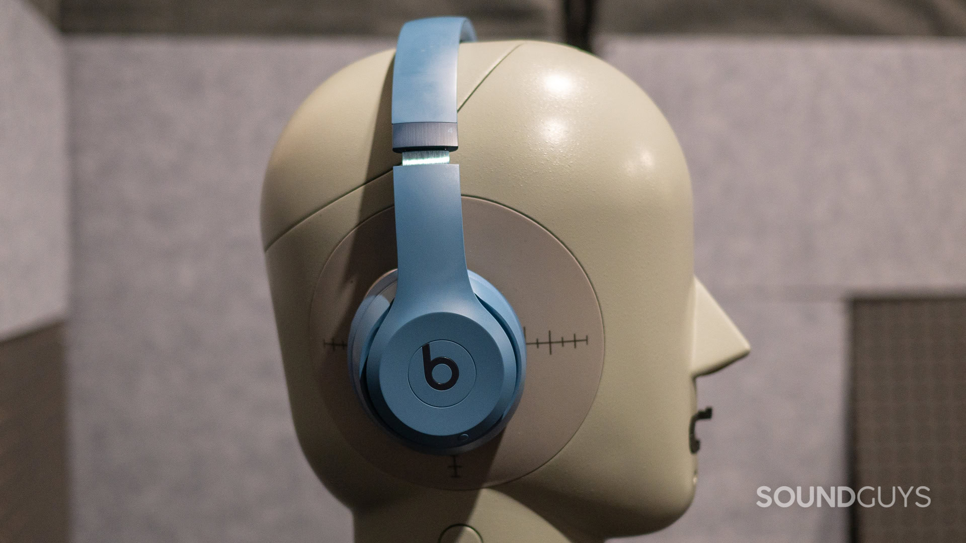 A photo of the Beats Solo 4 sitting atop a testing head.