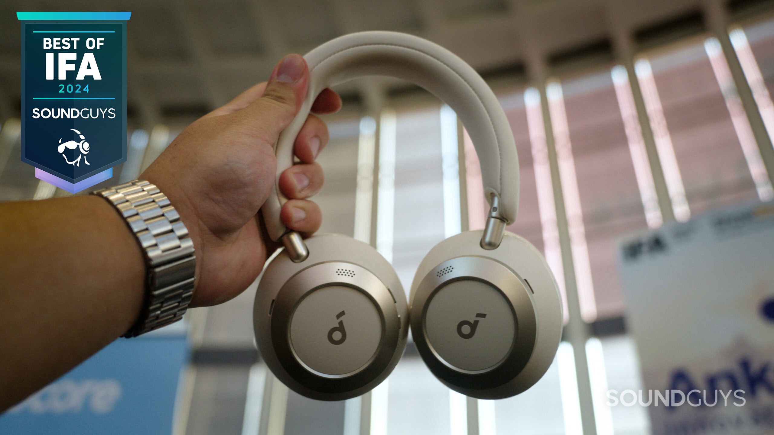 IFA-2024-Anker-Soundcore-Space-One-Pro-in-hand-scaled A hand holding the Anker Soundcore Space One Pro headphones.