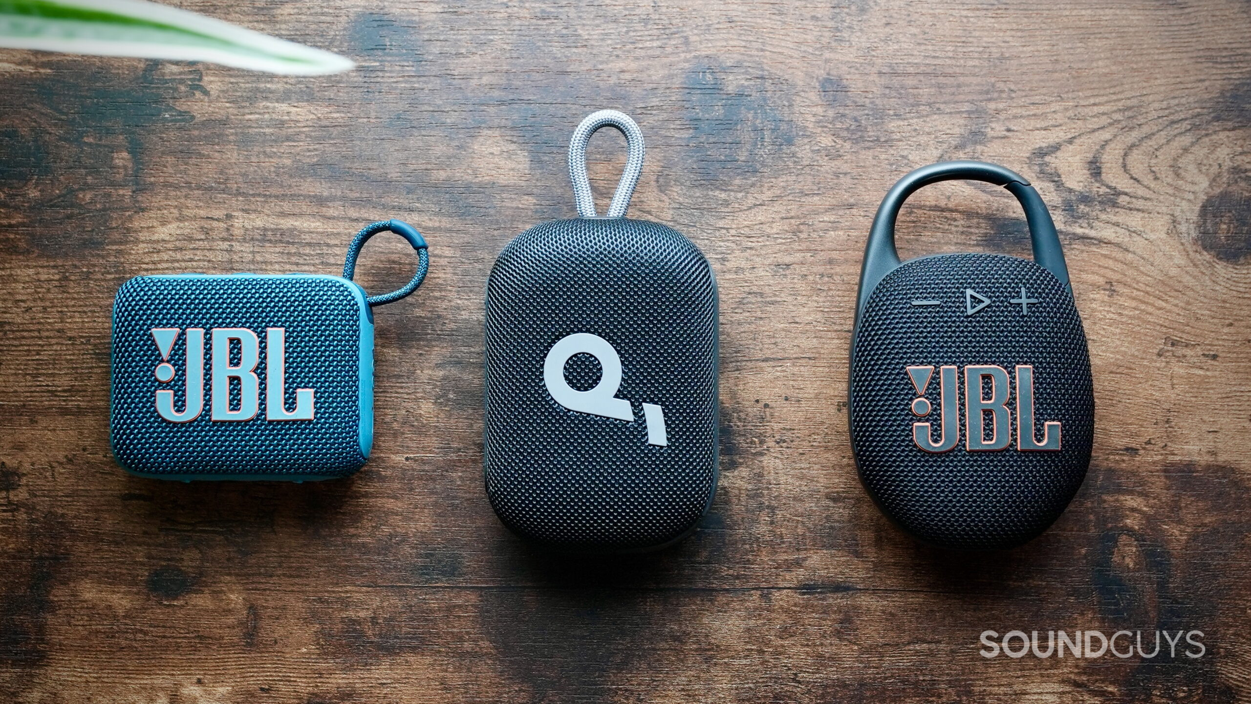 Select 4 Go - 1 (1) Top down photo of the JBL Go 4, Soundcore Select 4 Go and JBL Clip 5 all in a lineup.