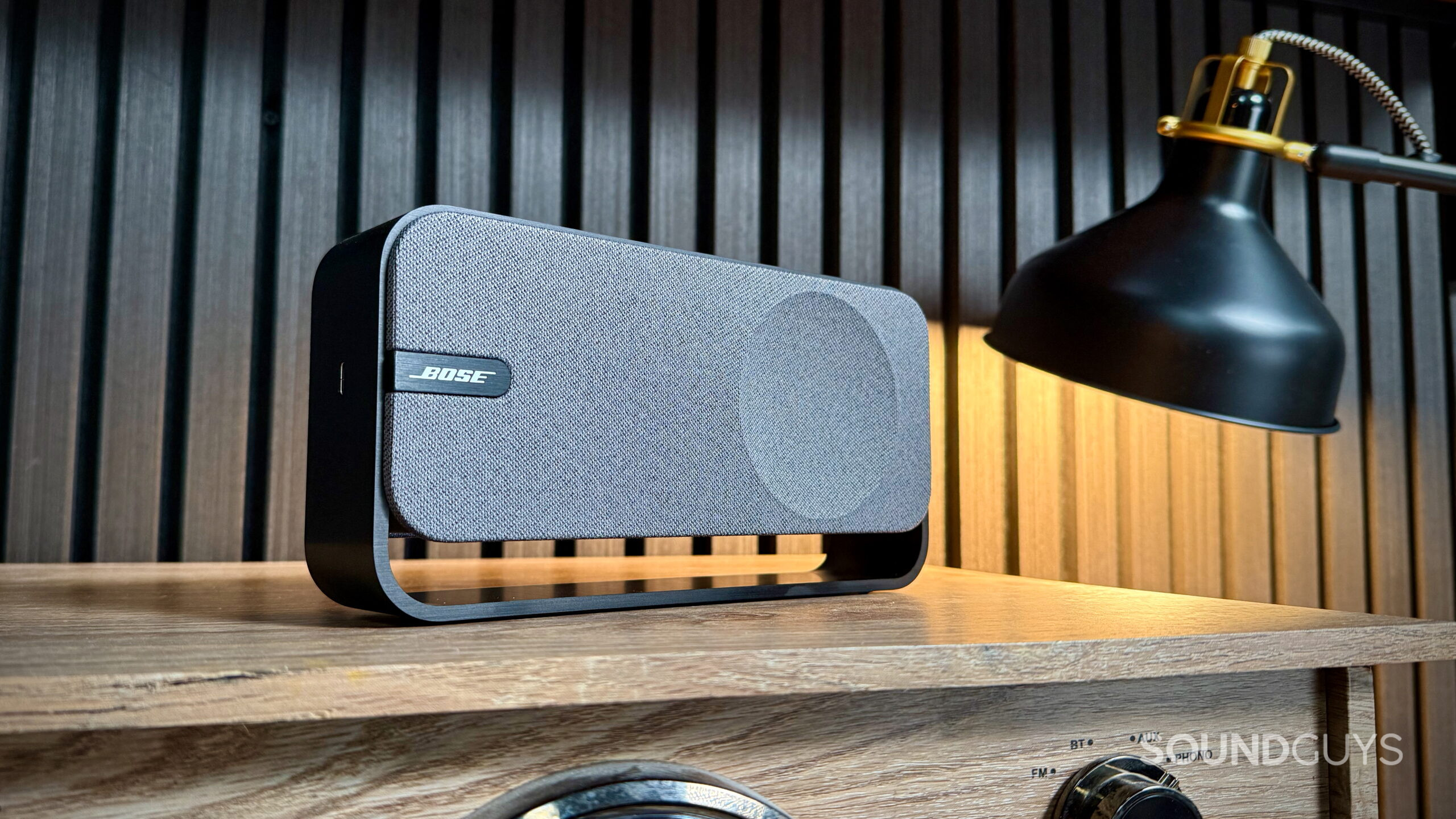 A Bose SoundLink Home speaker in a warm home environment.