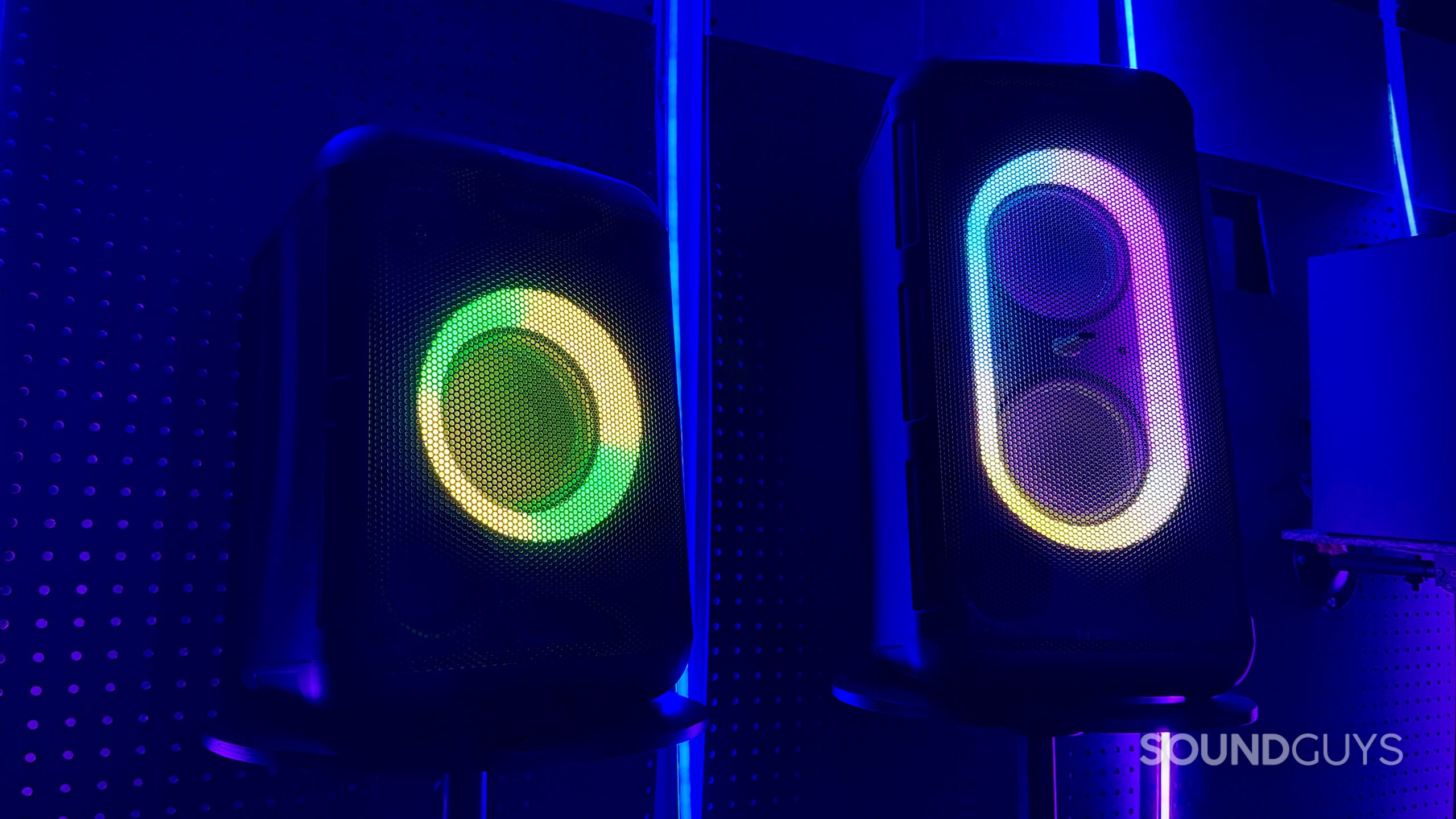 Panasonic BMAX Speakers - 8 A Panasonic BMAX 5 and 10 placed on stools in an LED-lit room.