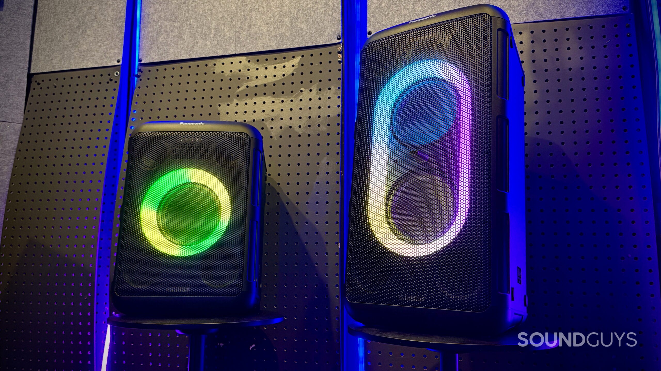 Panasonic BMAX Speakers - 9 A Panasonic BMAX 5 and 10 placed on stools in an LED-lit room.