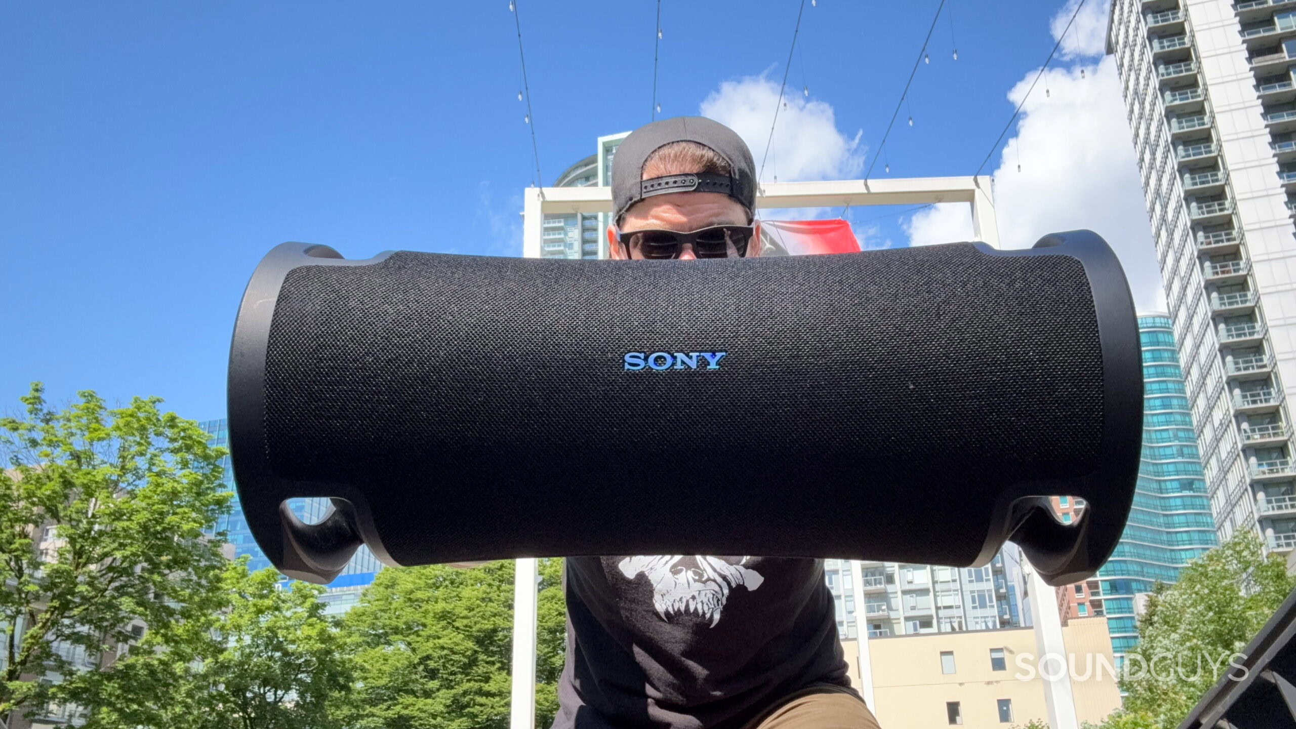 ULT Field 7 - 7 A man holding the Sony ULT Field 7
