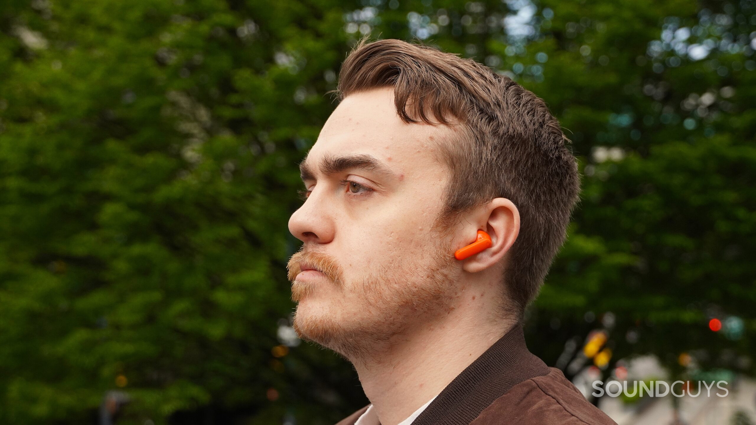 a man wearing the cmf buds 2 a man wearing the cmf buds 2