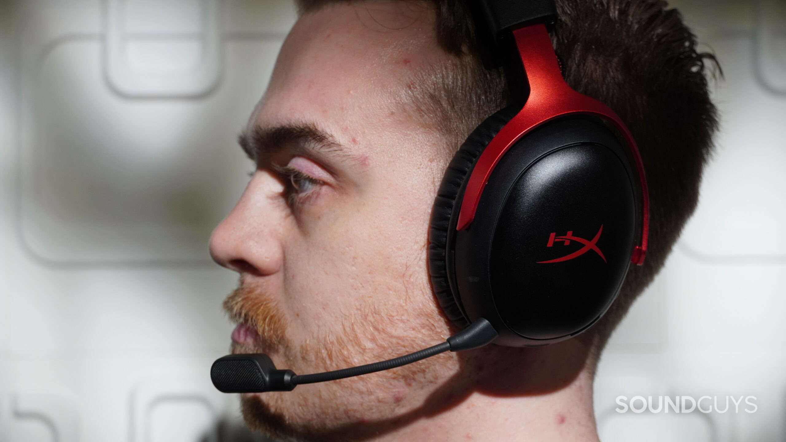 hyperx cloud 3 s profile a profile view of a man wearing the hyperx cloud 3 s