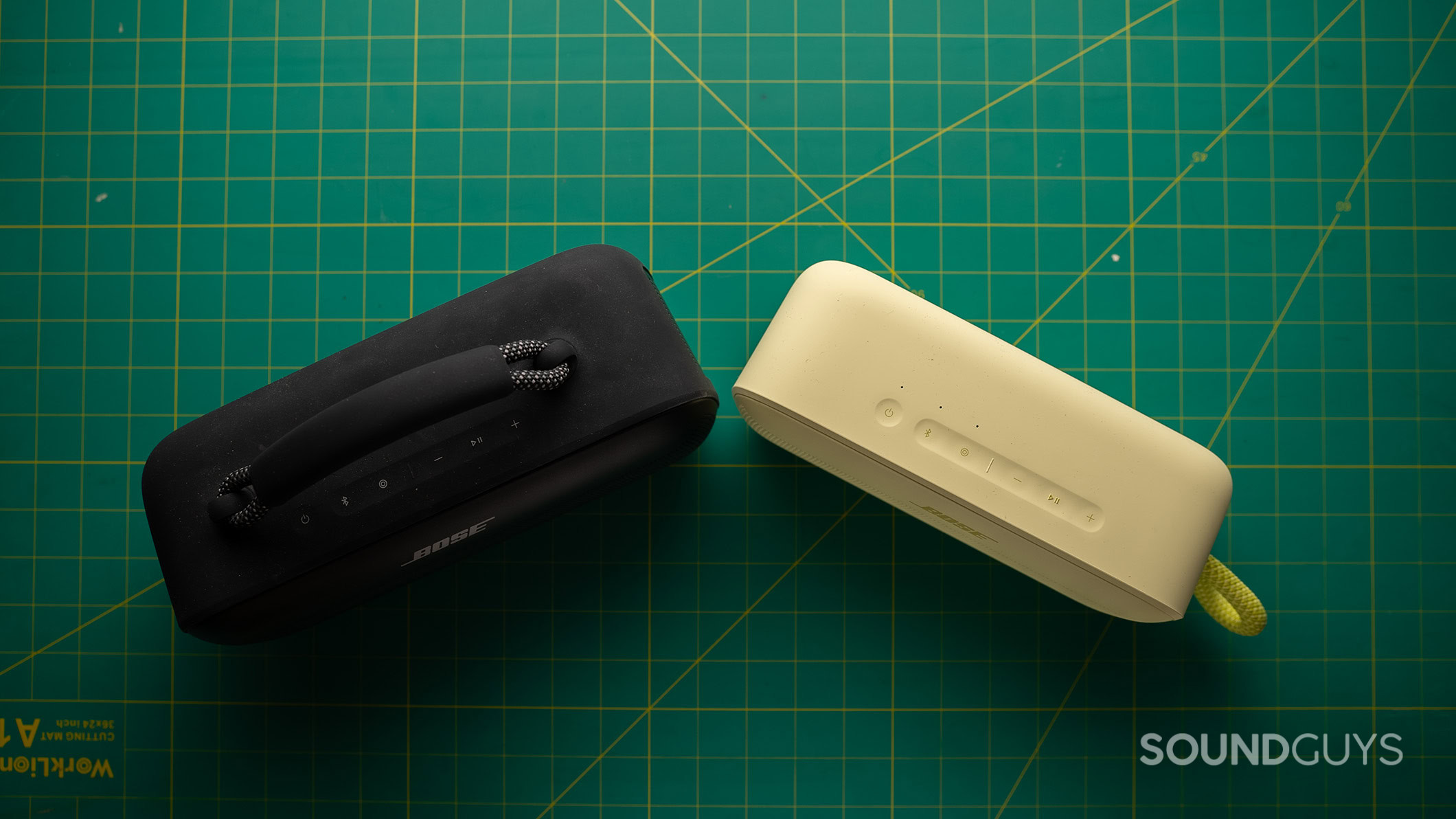 Bose SoundLink Plus vs Bose SoundLink Max top down A Bose SoundLink Plus next to a Bose SoundLink Max