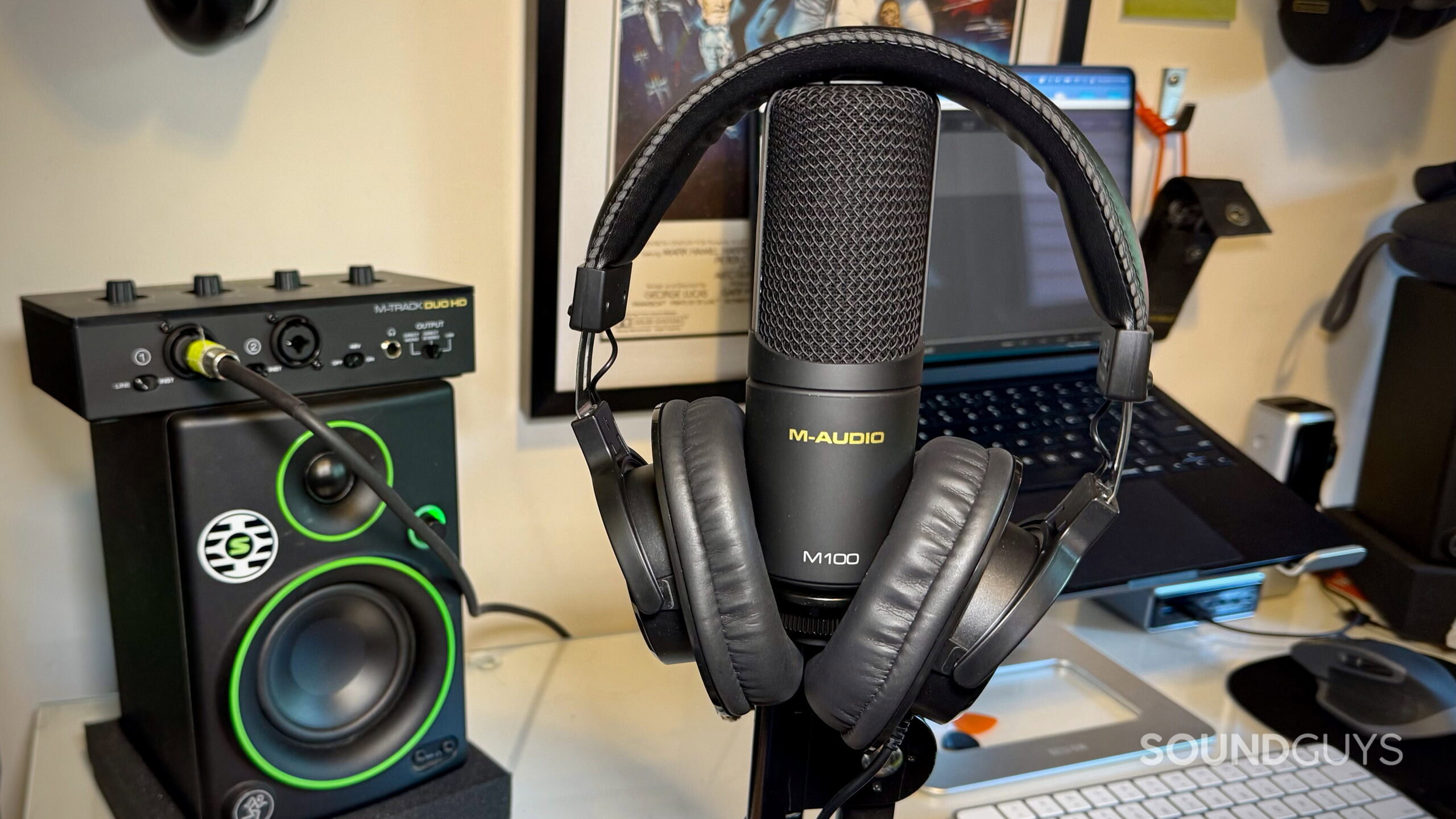 MAUDIO V.2 - 5 M-Audio M-Track Duo HD interface package on a desktop, showing its the headphones, interface and mic.