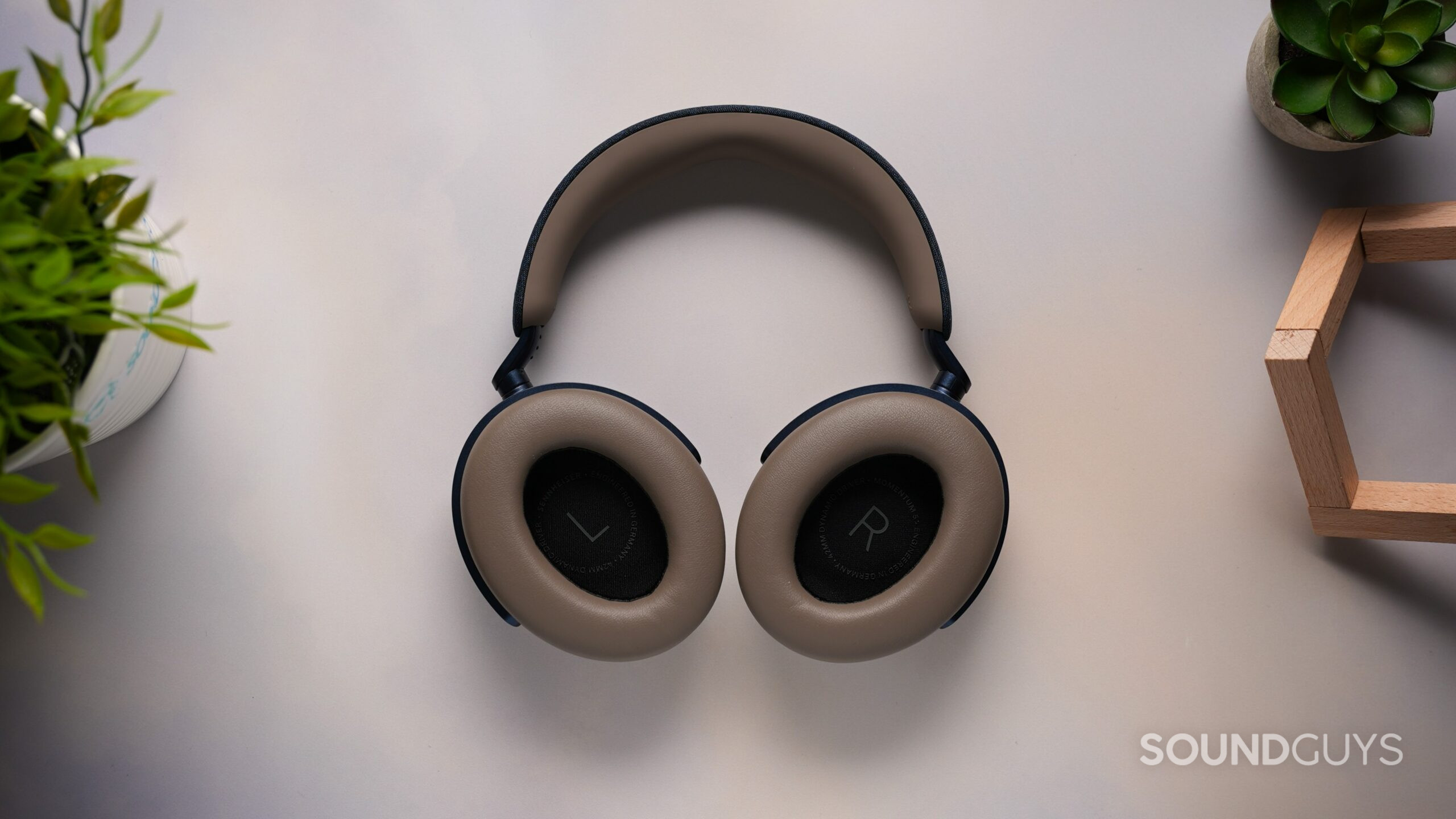 Sennheiser MOMENTUM 5 Wireless face up Top-down view of the Sennheiser MOMENTUM 5 Wireless headphones showing the cushioned ear pads and headband.