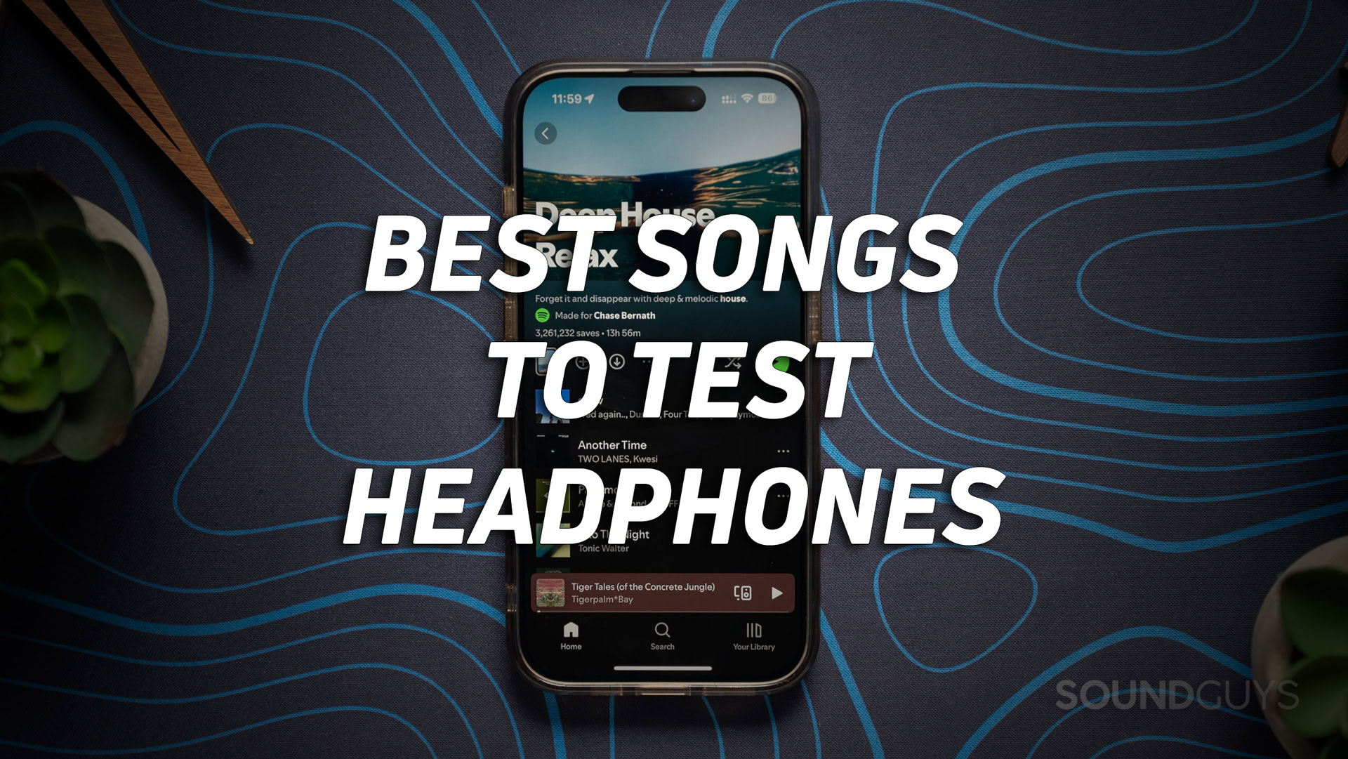 best-songs-to-test-headphones-hero A photo of a smartphone, with the bold white text "best songs to test headphones" overlaid.