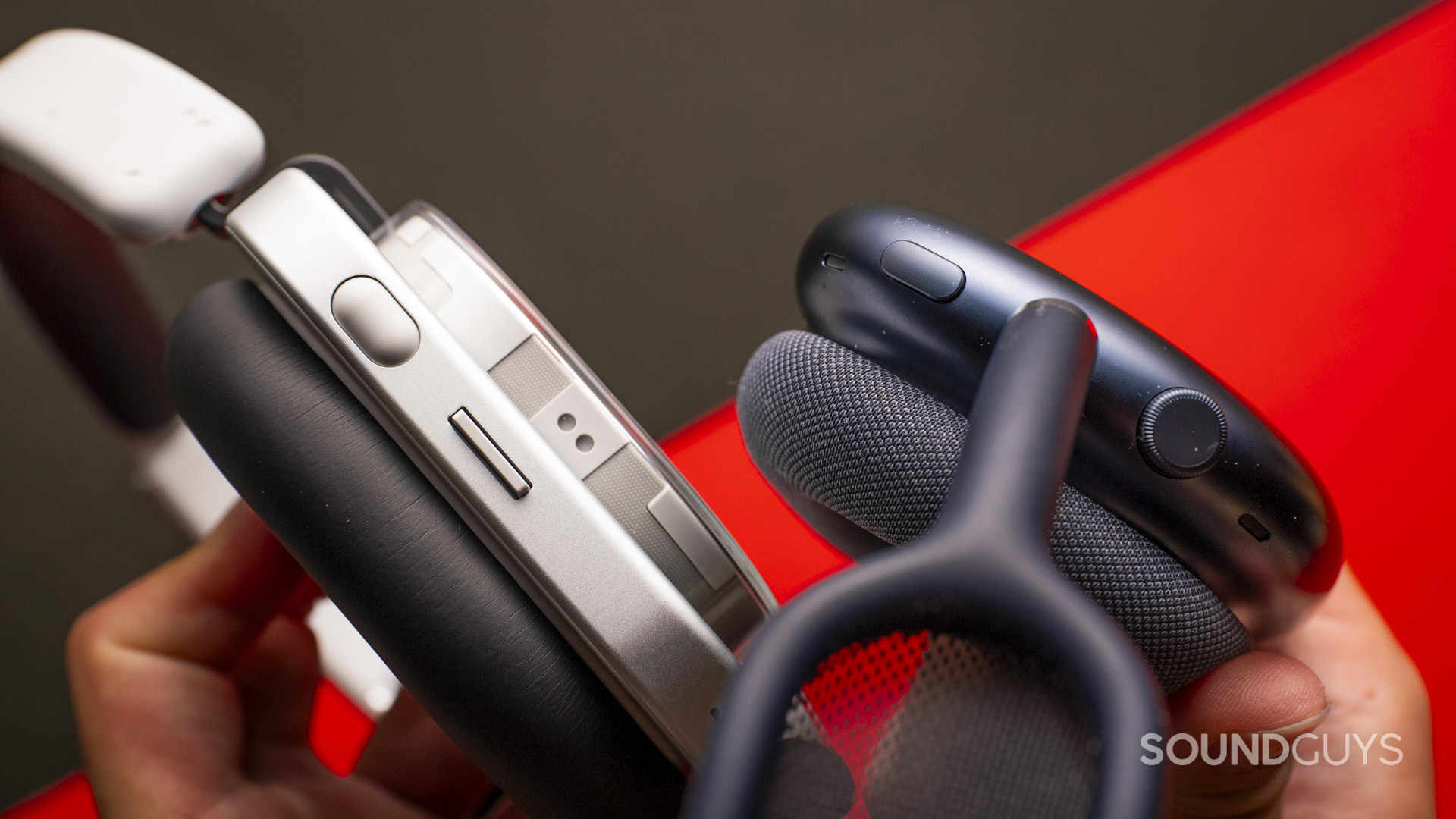 nothing-headphone-1-vs-apple-airpods-max-buttons-controls Nothing Headphone (1) next to Apple AirPods Max.