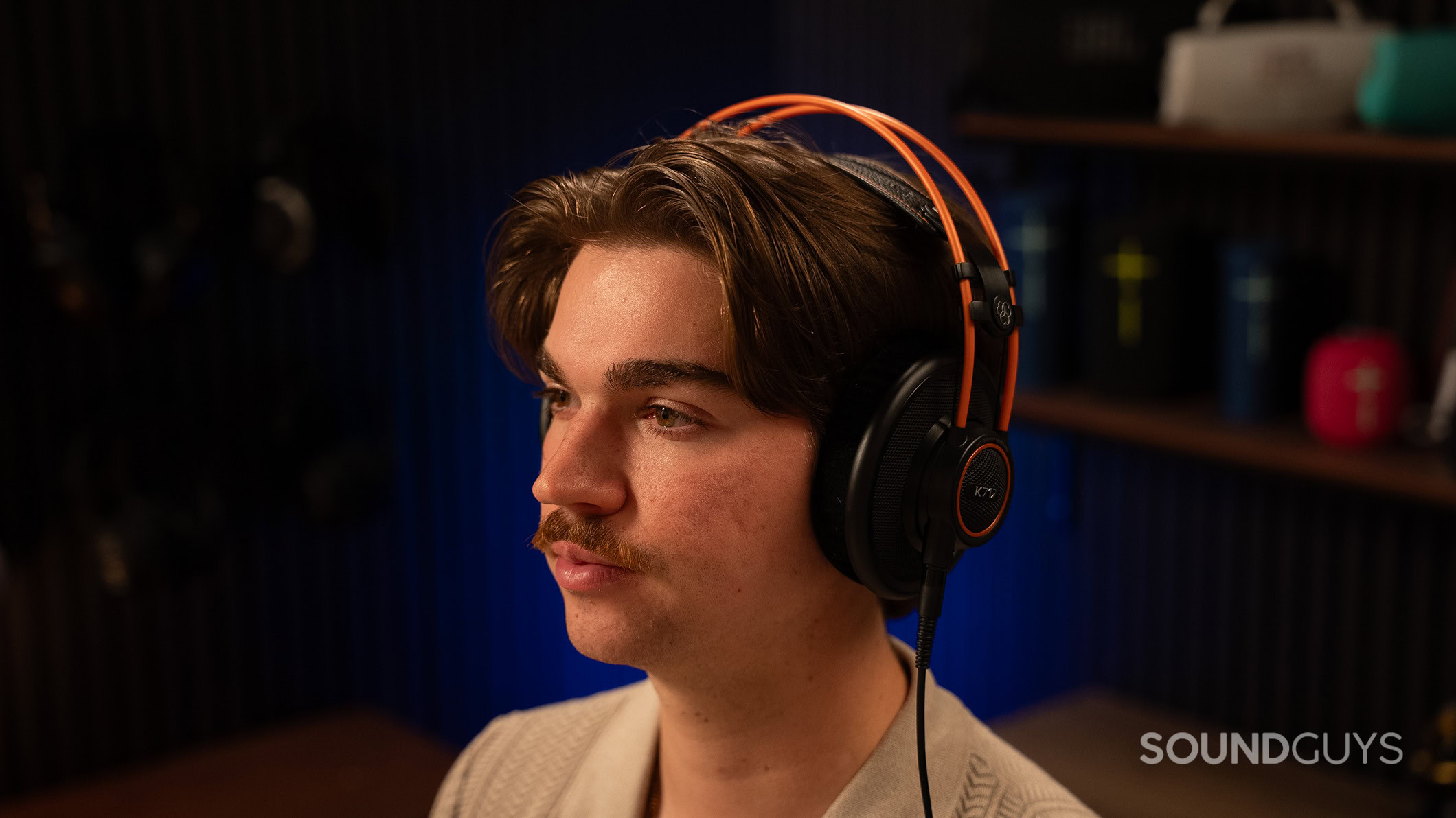 A man wearing the AKG K712 headphones.