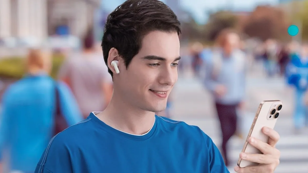 Baseus-Bass-BP1-Pro-Earbuds-Lifestyle-Image Baseus Bass BP1 Pro earbuds worn by a man.