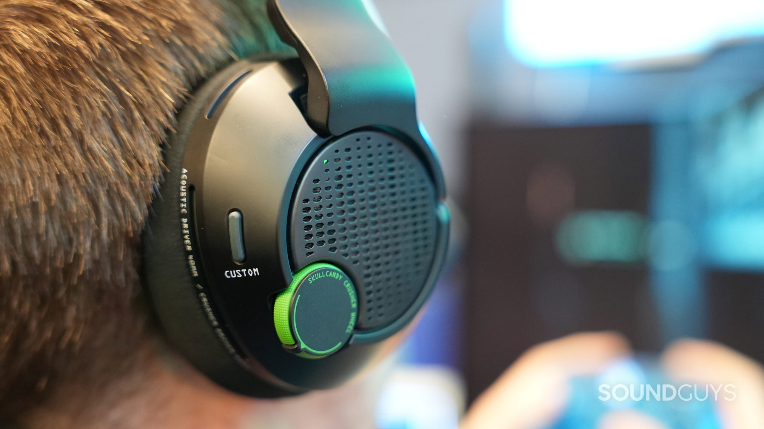 a close-up of the crusher plyr 720 earcup on a mans head.