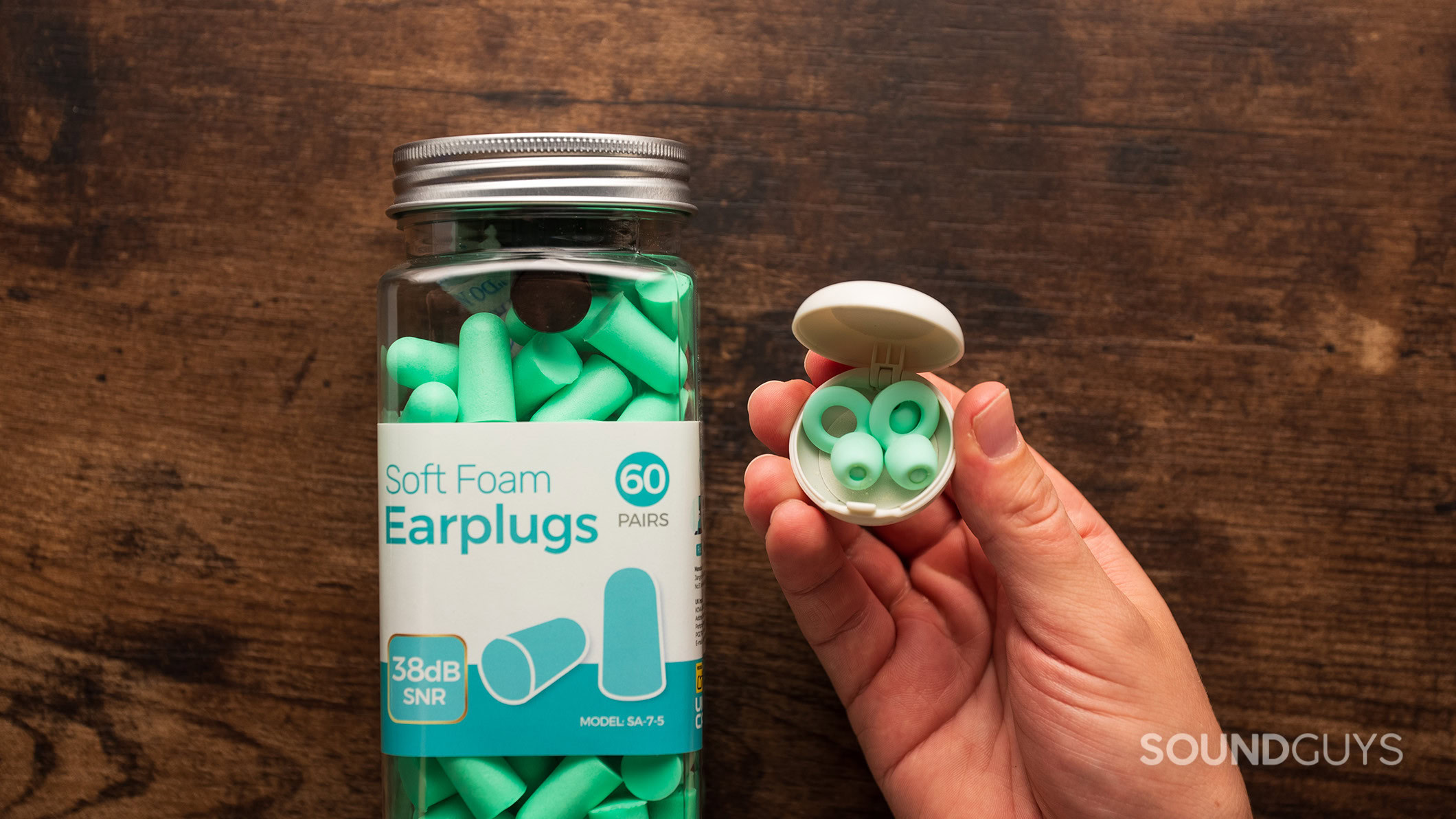 Foam earplugs vs Loop earplugs in case Soft foam earplugs next to Loop earplugs.