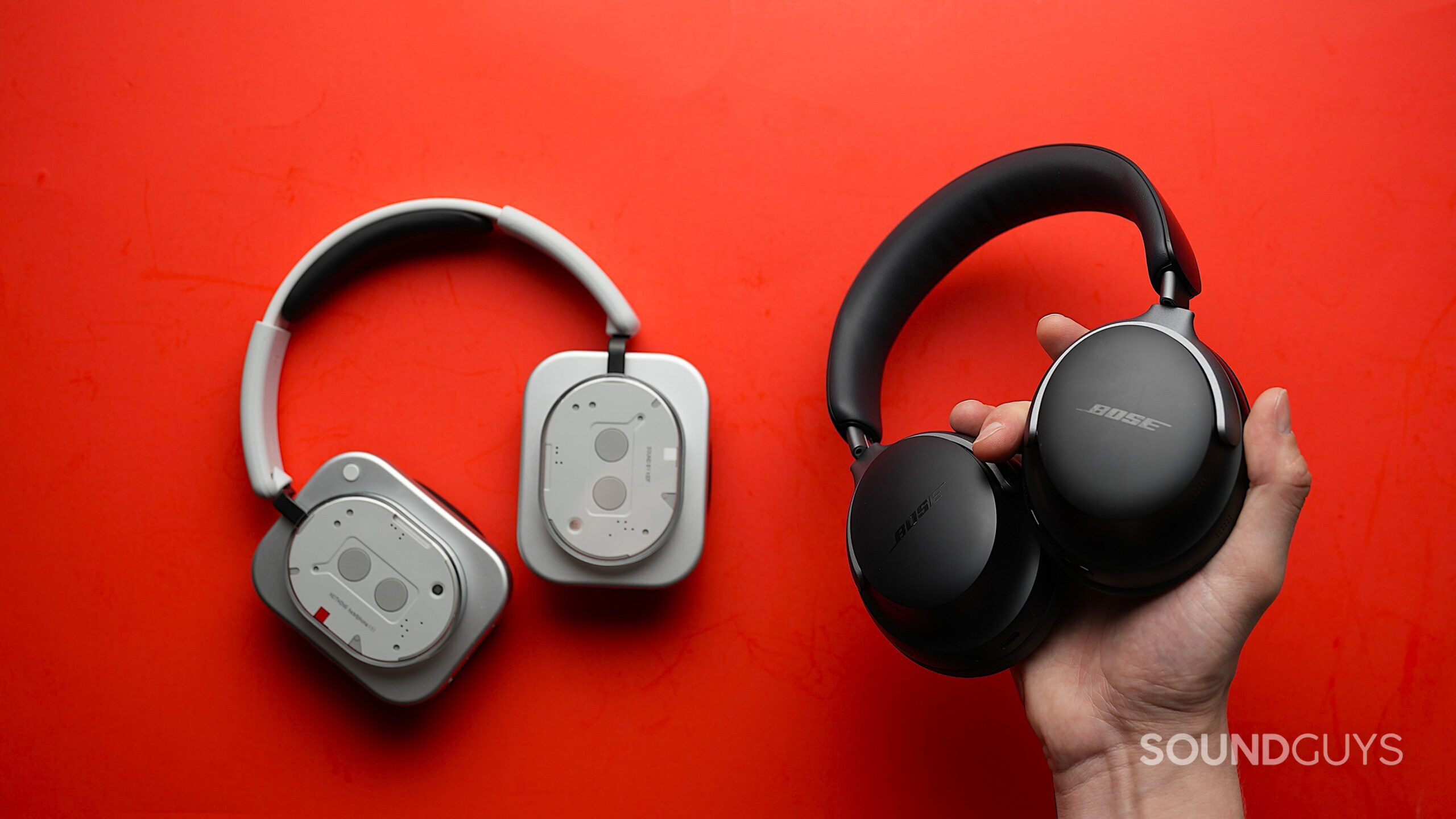 a hand bolding bose qc ultra headphone vs nothing