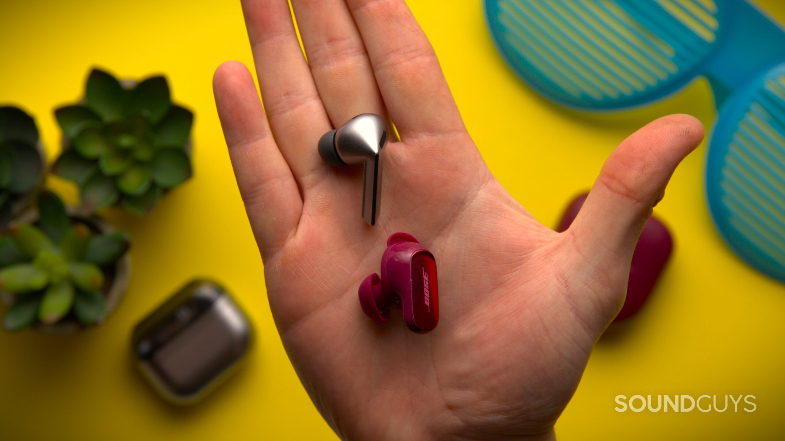 galaxy buds 3 pro vs bose qc ultra 2 cearbuds in hand