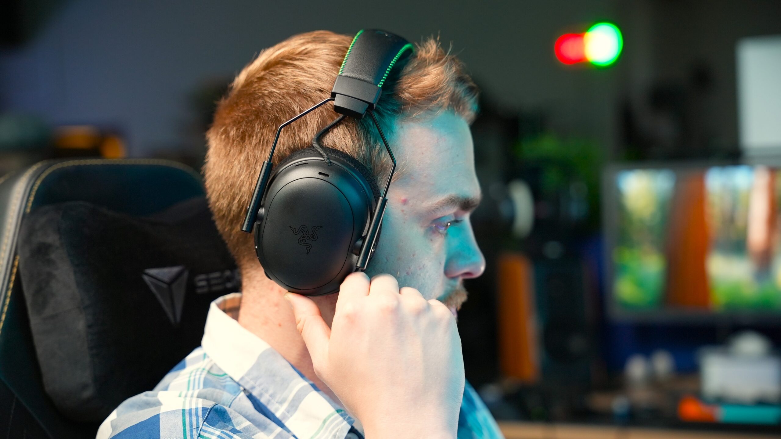 wearing razer blackshark v3 pro a man wearing razer blackshark v3 pro