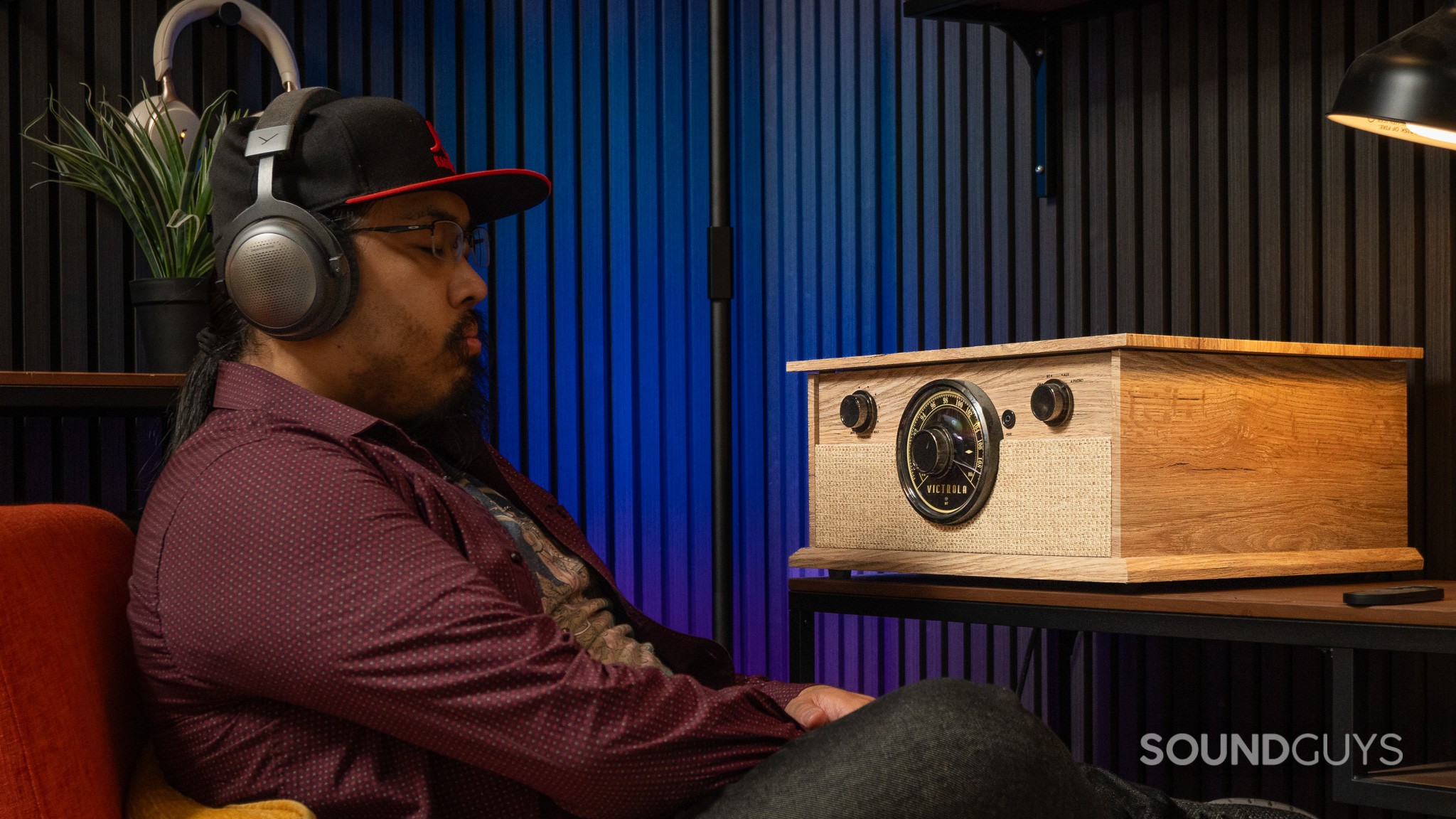 Do we listen to music anymore? Man sitting and listening to radio with headphones