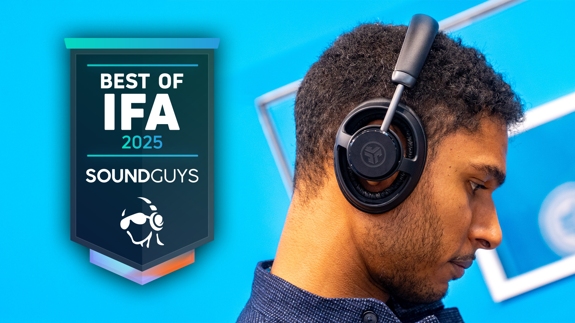 Best of IFA 2025 featured image Man wearing JLab JBuds Open wireless headphones with SoundGuys best of IFA 2025 logo
