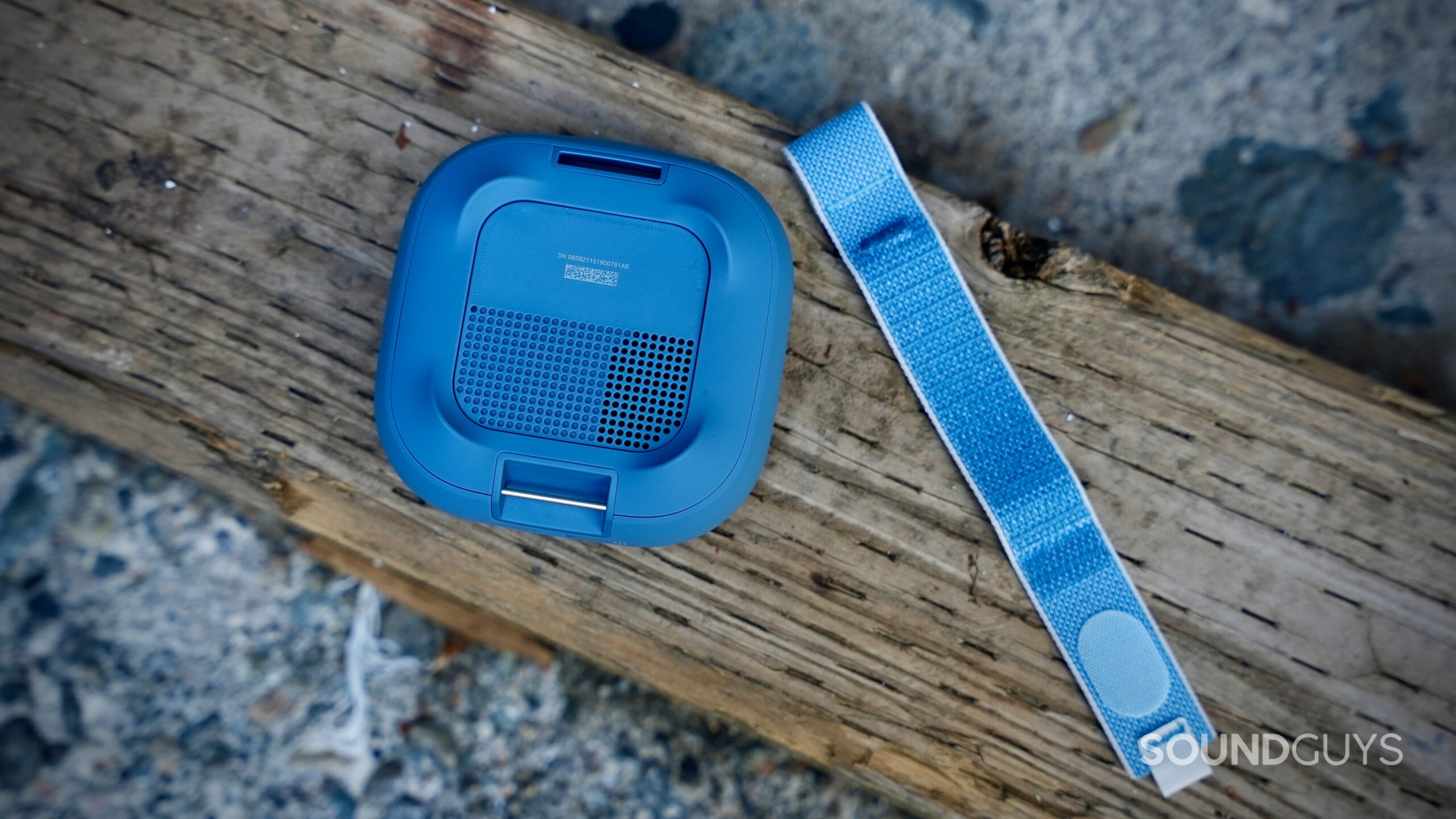 A Bose SoundLink Micro (2nd Gen) attached to a man's belt.