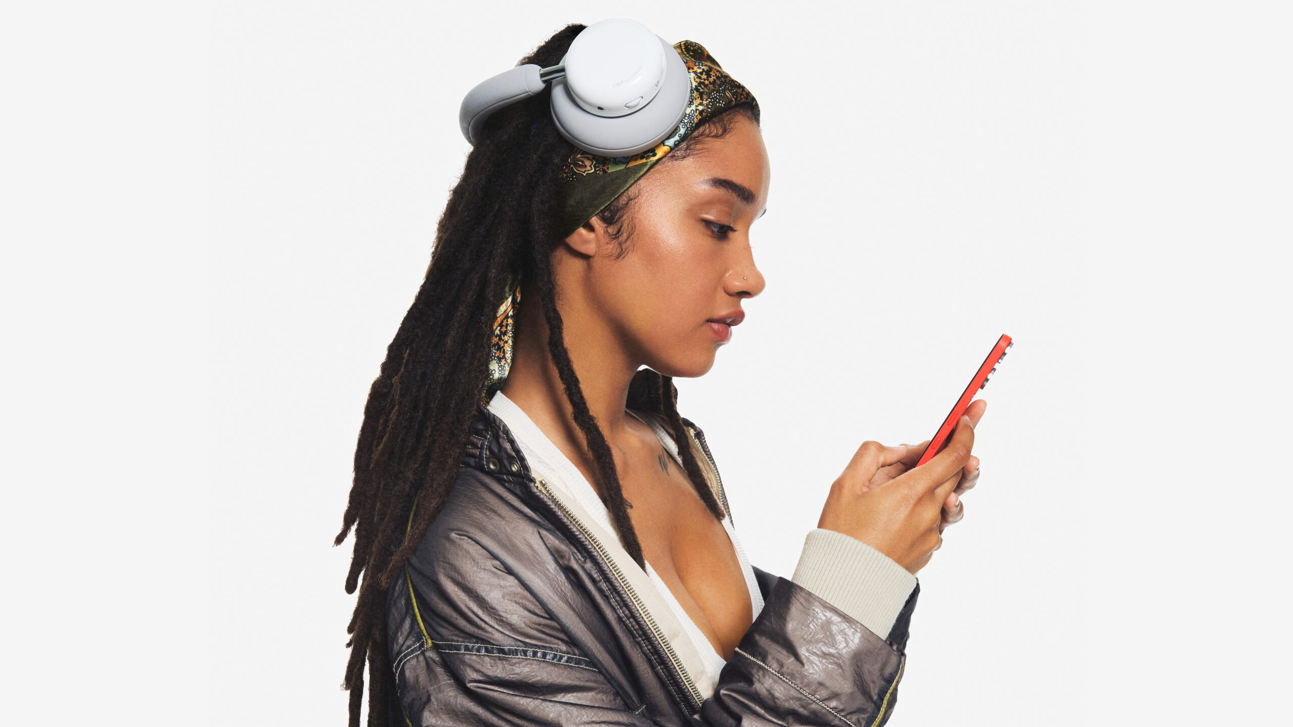 a woman wearing the cmf headphone pro