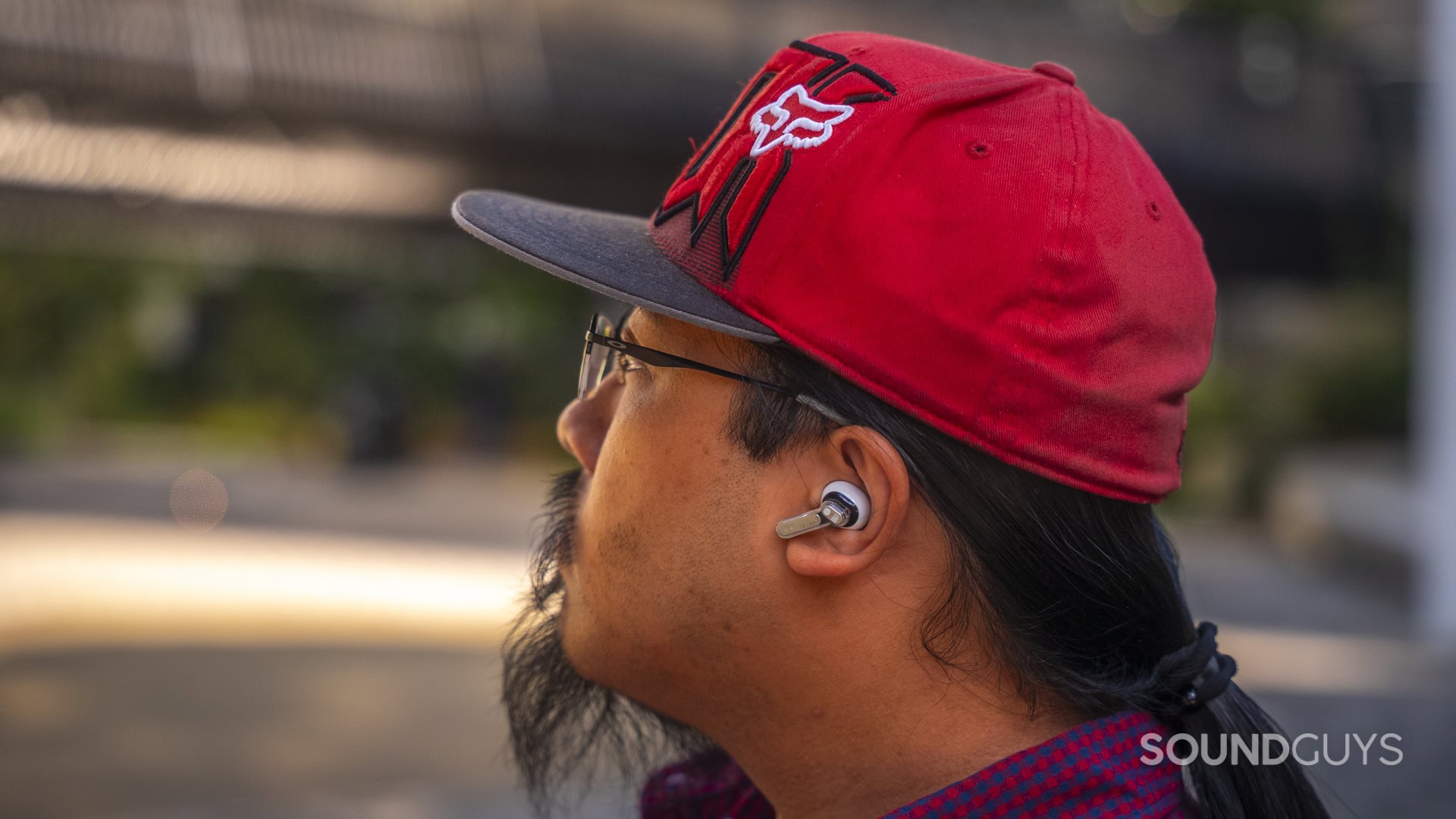 a man wearing the nothing ear 3