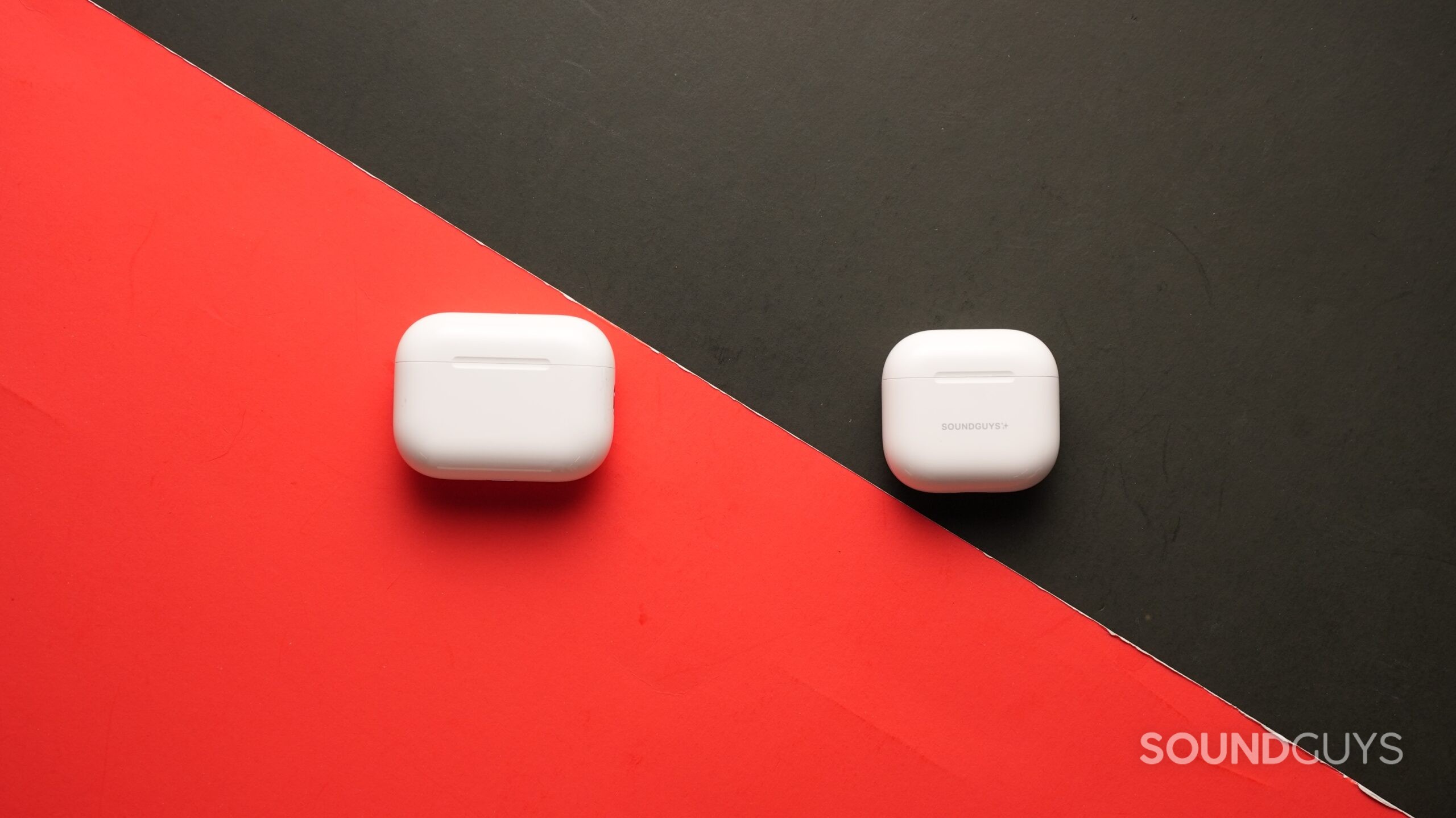 The AirPods Pro 3 and AirPods 4 sit on a table. Each right earbud sits in the centre.