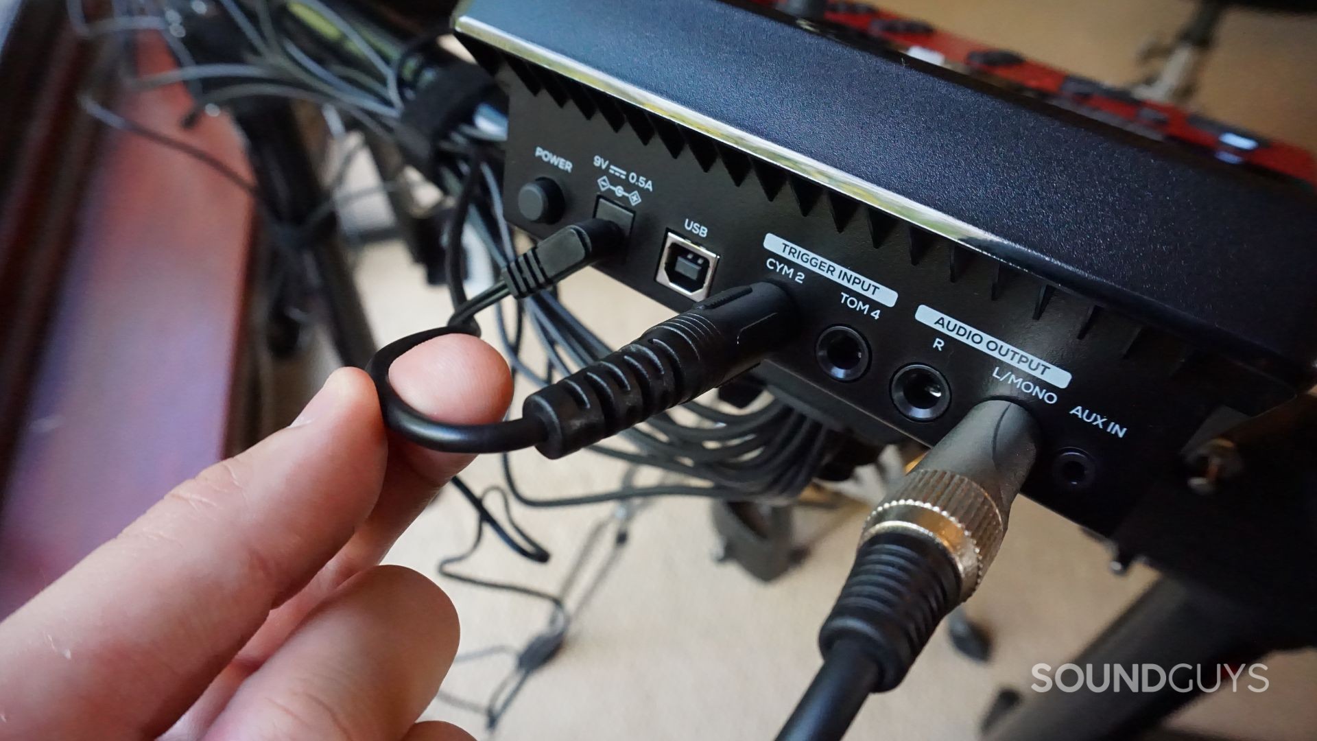 Alesis-Nitro-Ultimate-Drum-Module-Ins-And-Outs A photograph of the Alesis Nitro Ultimate drum module's back panel.