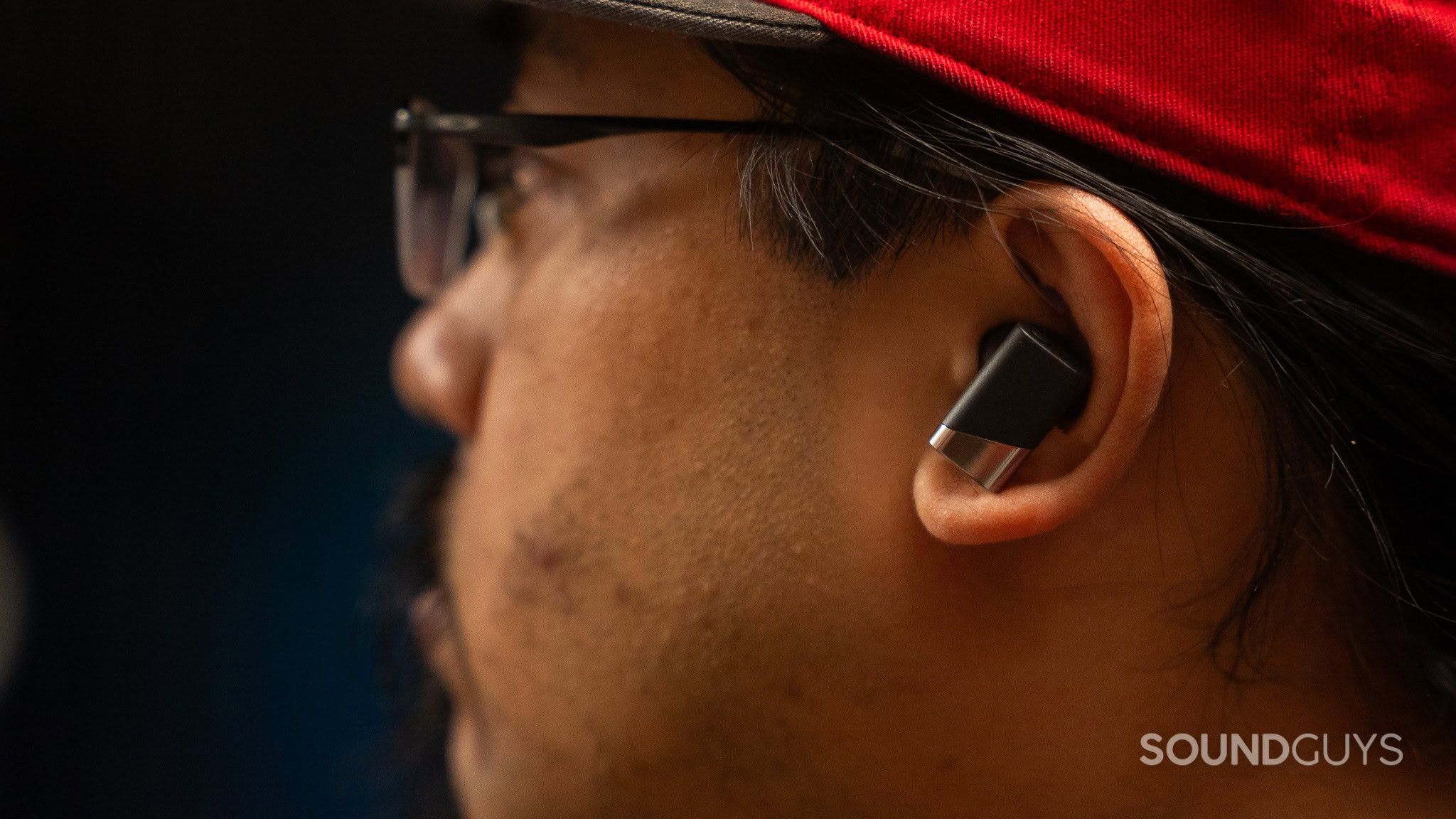 Status Pro X worn by man in cap Status Pro X being worn by a man with a cap.