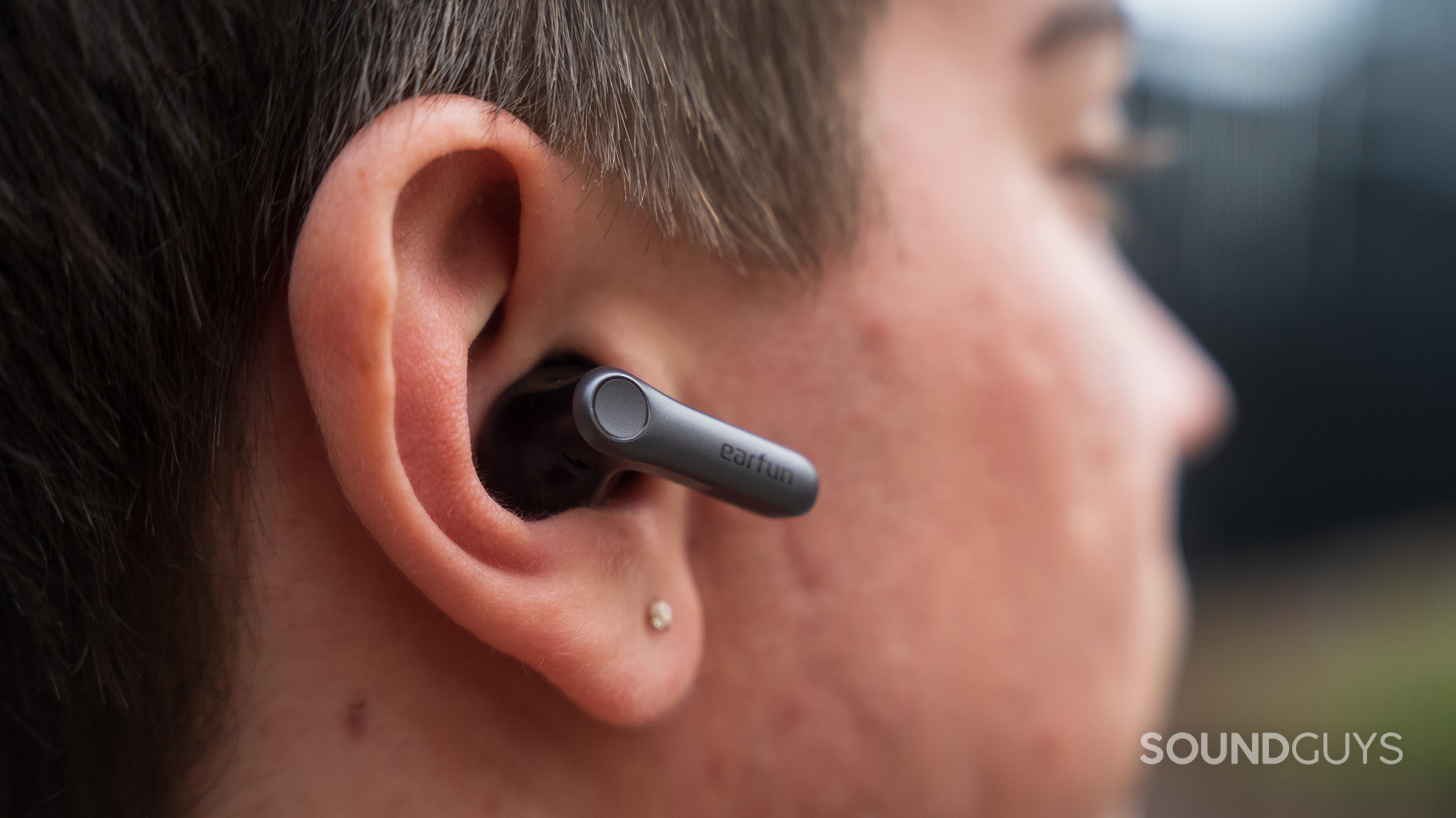 EarFun Air Pro 4 plus earbuds in ear A man wearing the EarFun Air Pro 4 Plus earbuds.