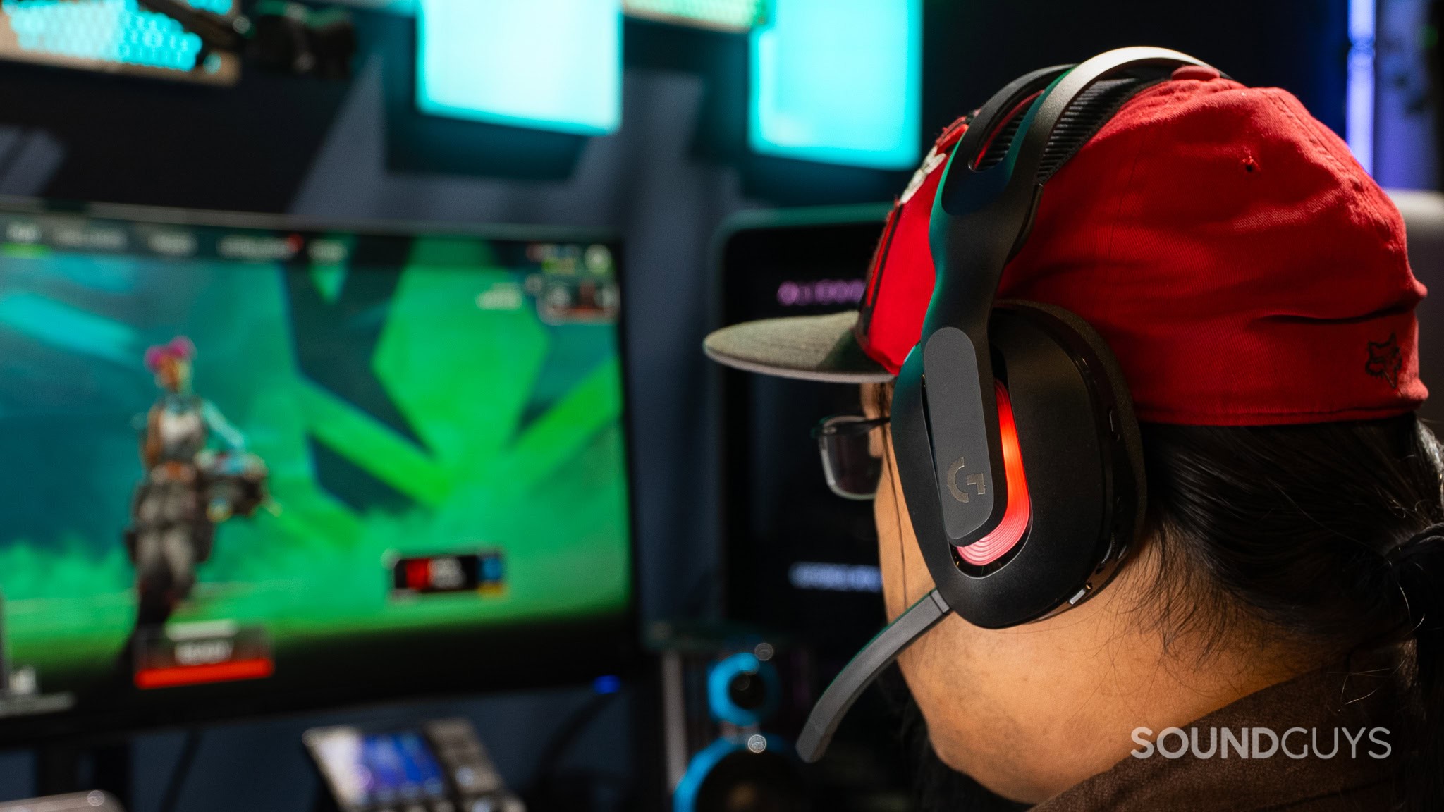 Gaming with the Logitech A20 X Logitech A20 X being worn by a person with a cap, playing a video game.