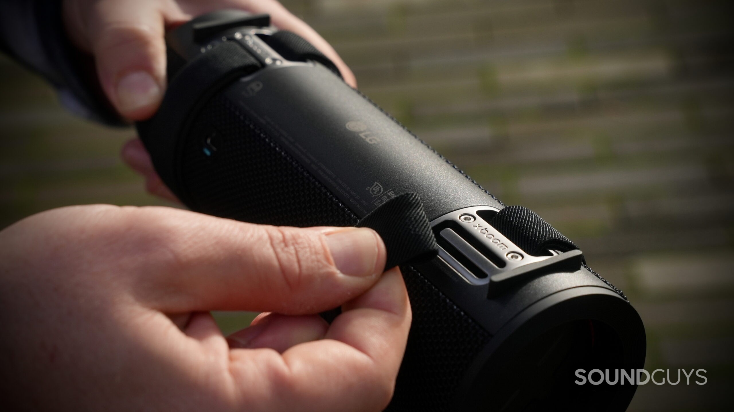 Close up of the LG xboom Grab's attachment strap.