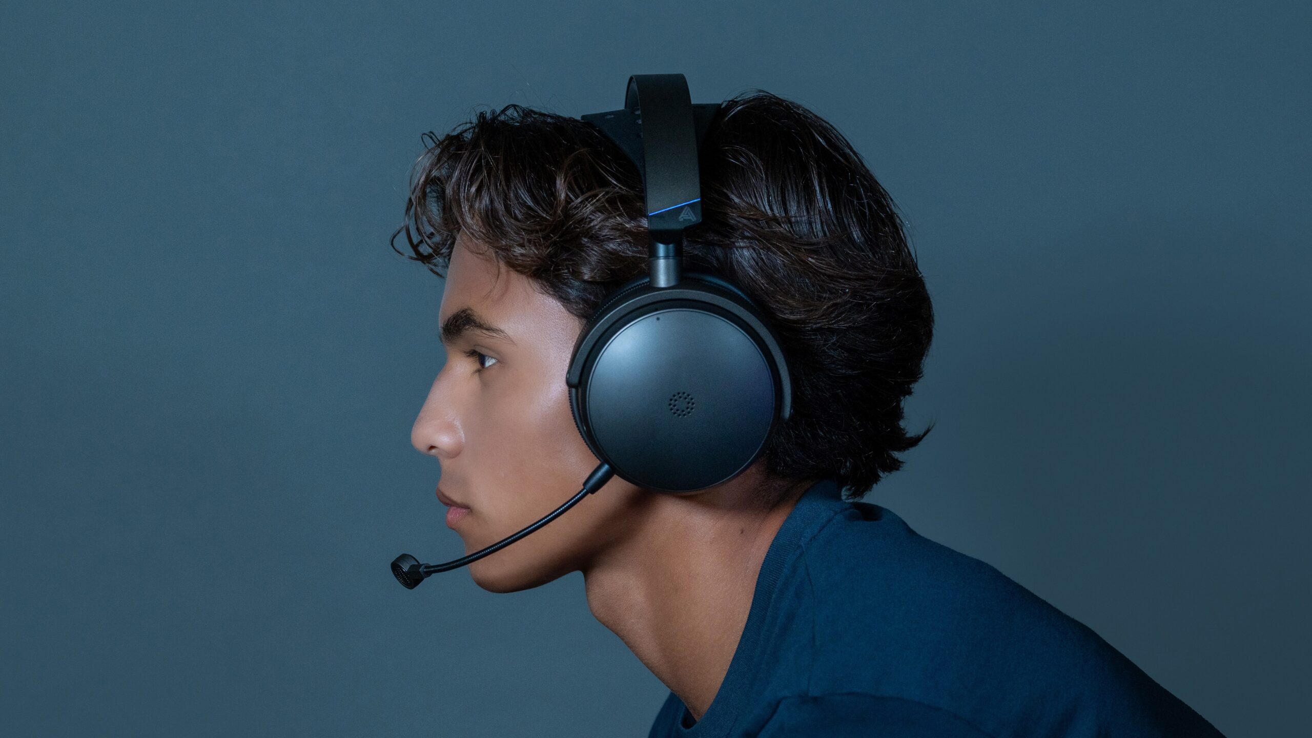 a man wearing the audeze maxwell 2