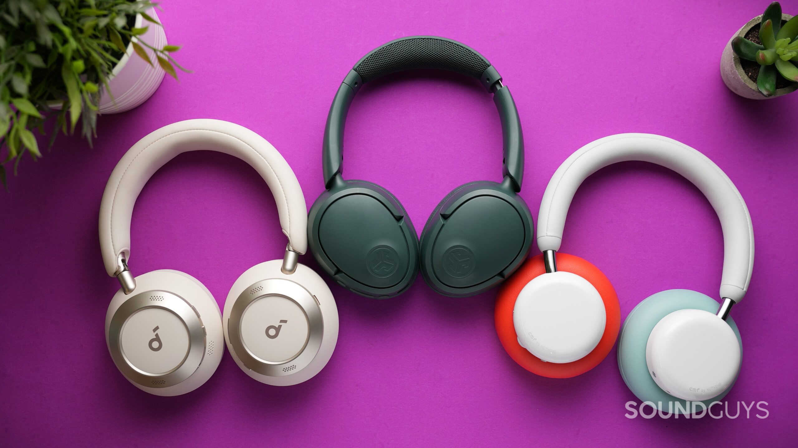 wireless headphones on purple background