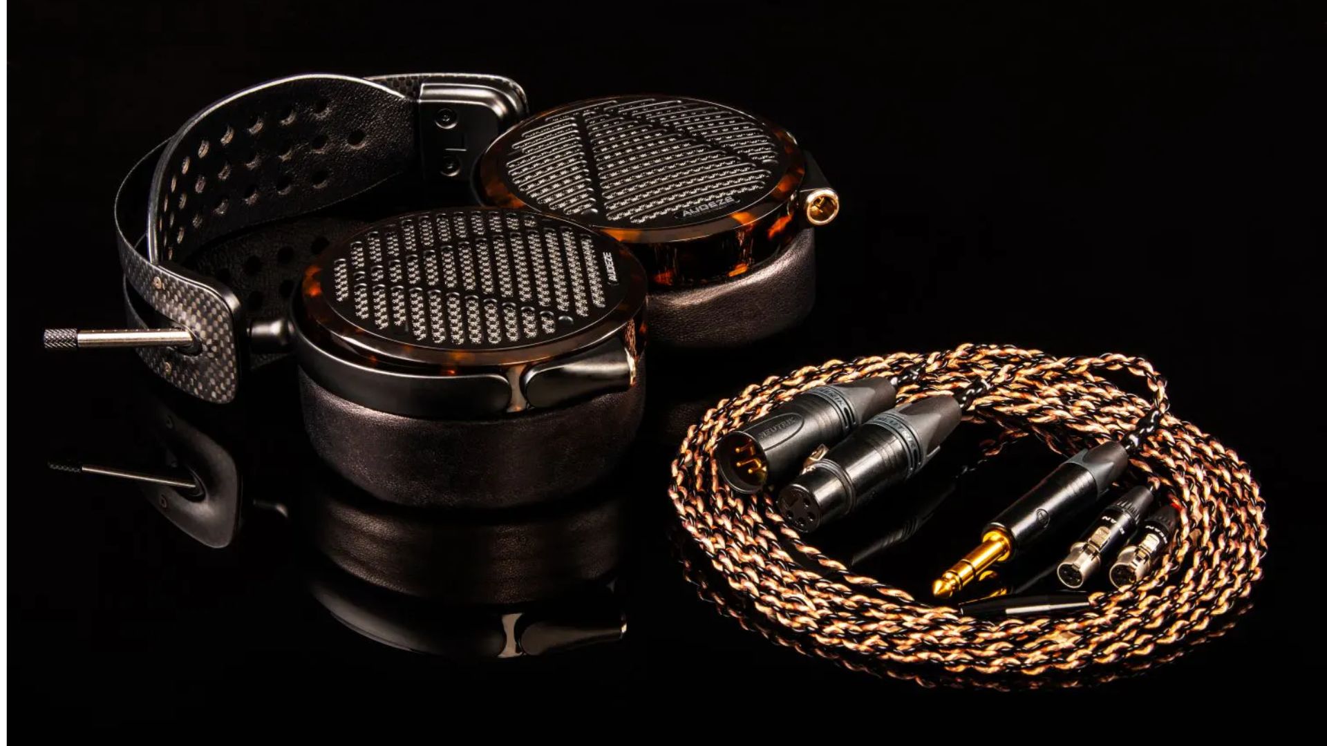 Audeze-LCD-5-headphones A photograph of the Audeze LCD-5 and cables.