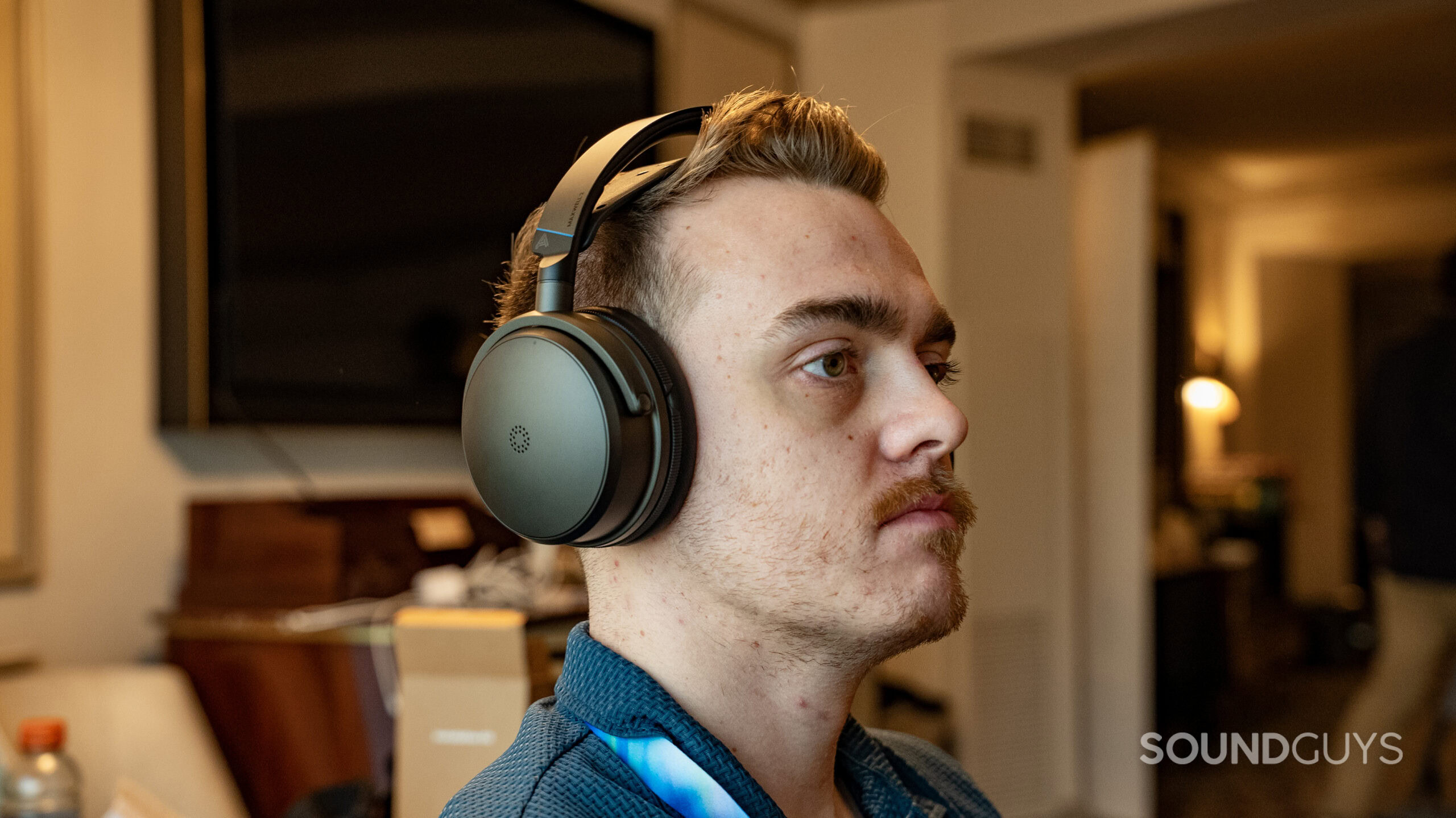DSC04884 A man wearing the audeze maxwell 2 anc gaming headset