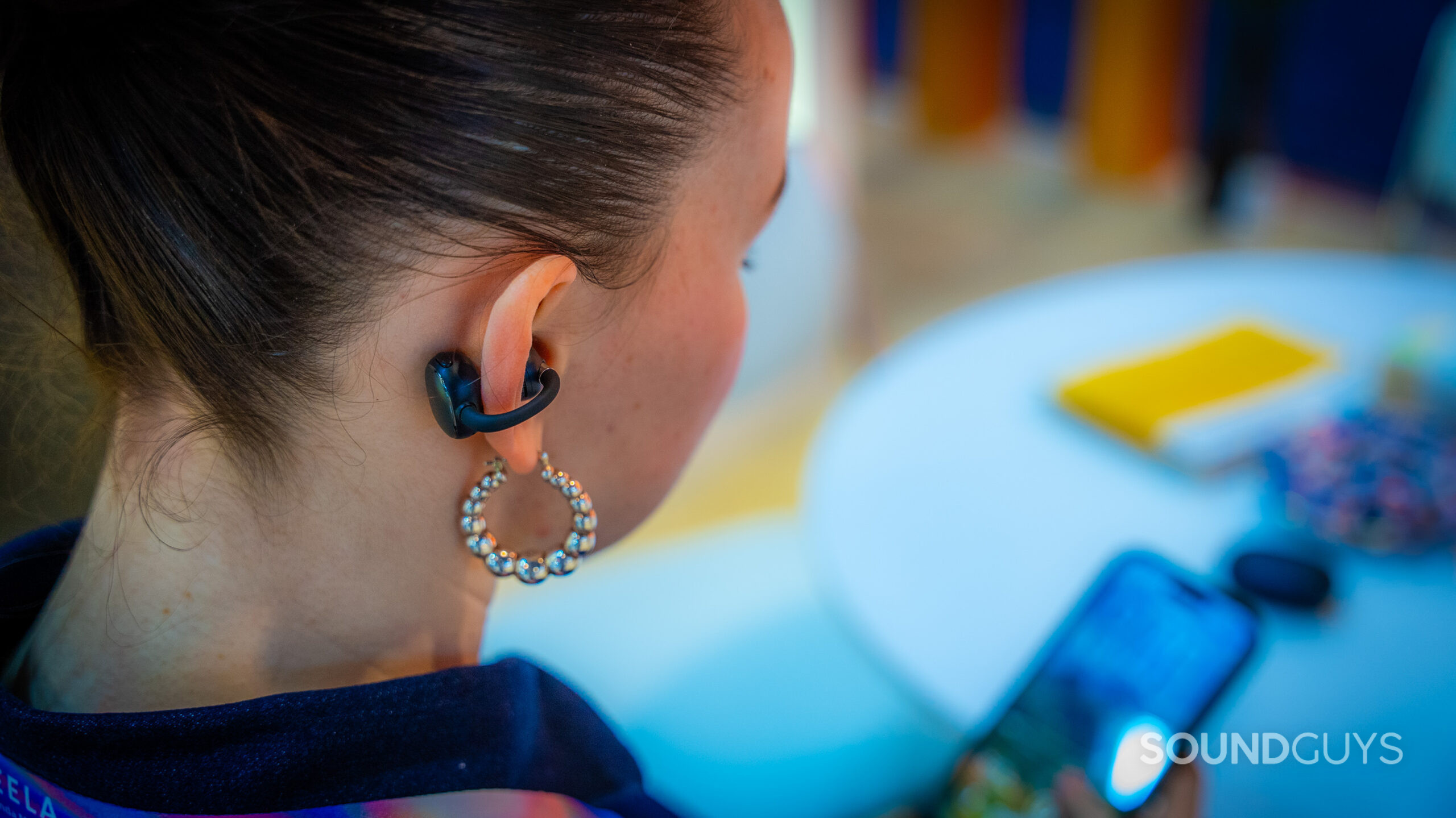 EarFun Clip 2 worn behind EarFun Clip 2 on ear.