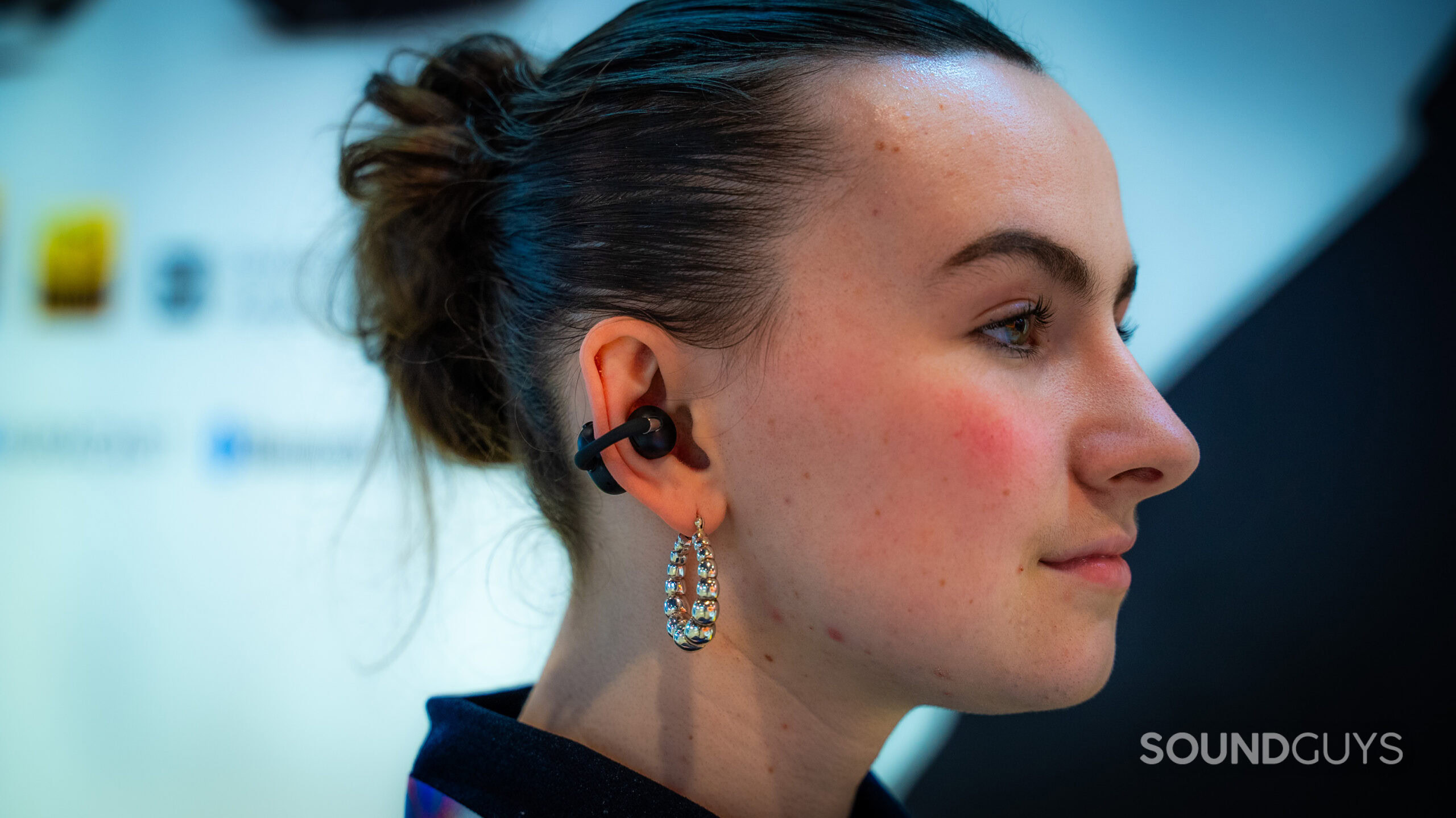 Woman wearing the EarFun Clip 2.