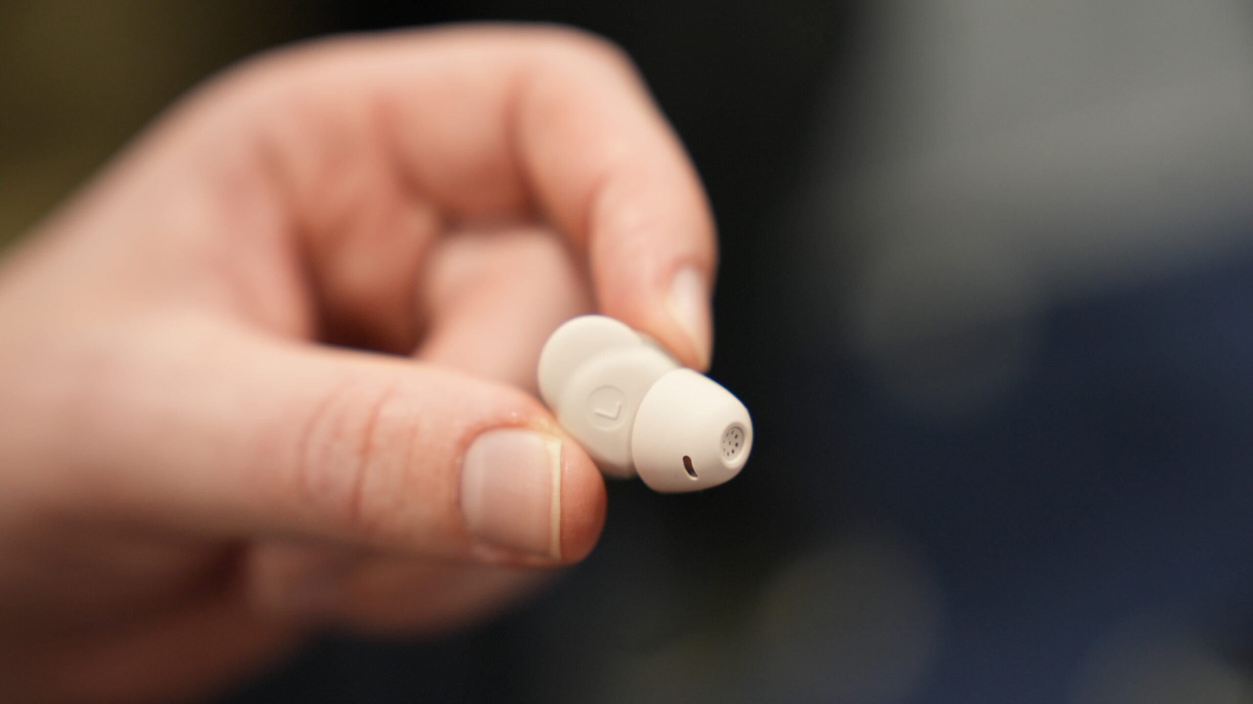 Elehear Delight Hearing Aid held Elehear Delight Hearing Aid held in hand.
