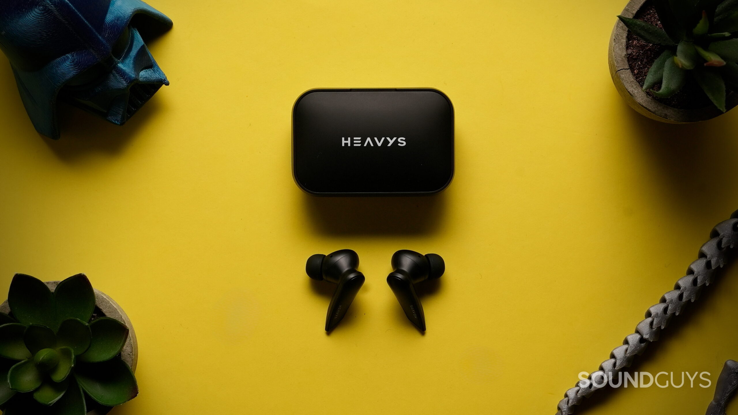 Top down photo of the Heavys H1E earbuds