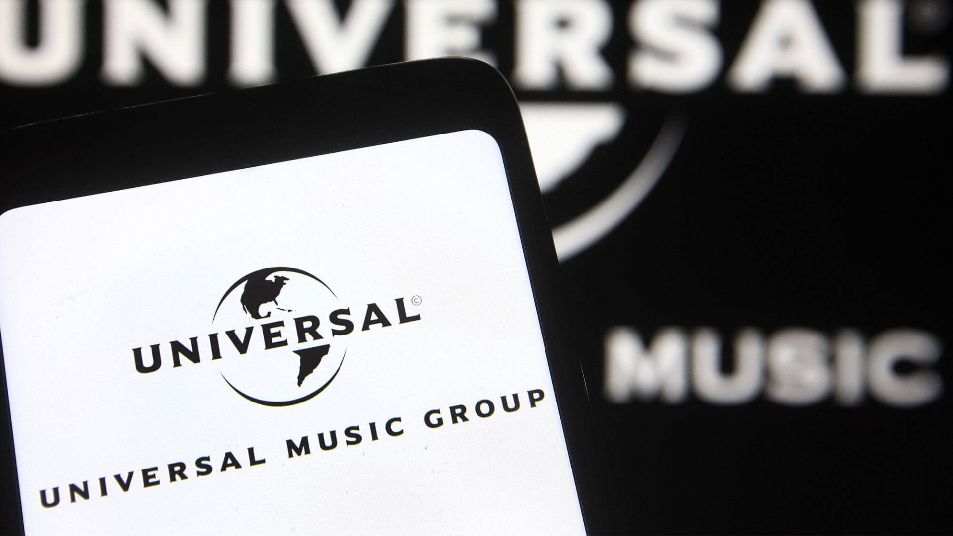 UMG-logo-on-phone A photograph of the Universal Music Group logo on mobile.