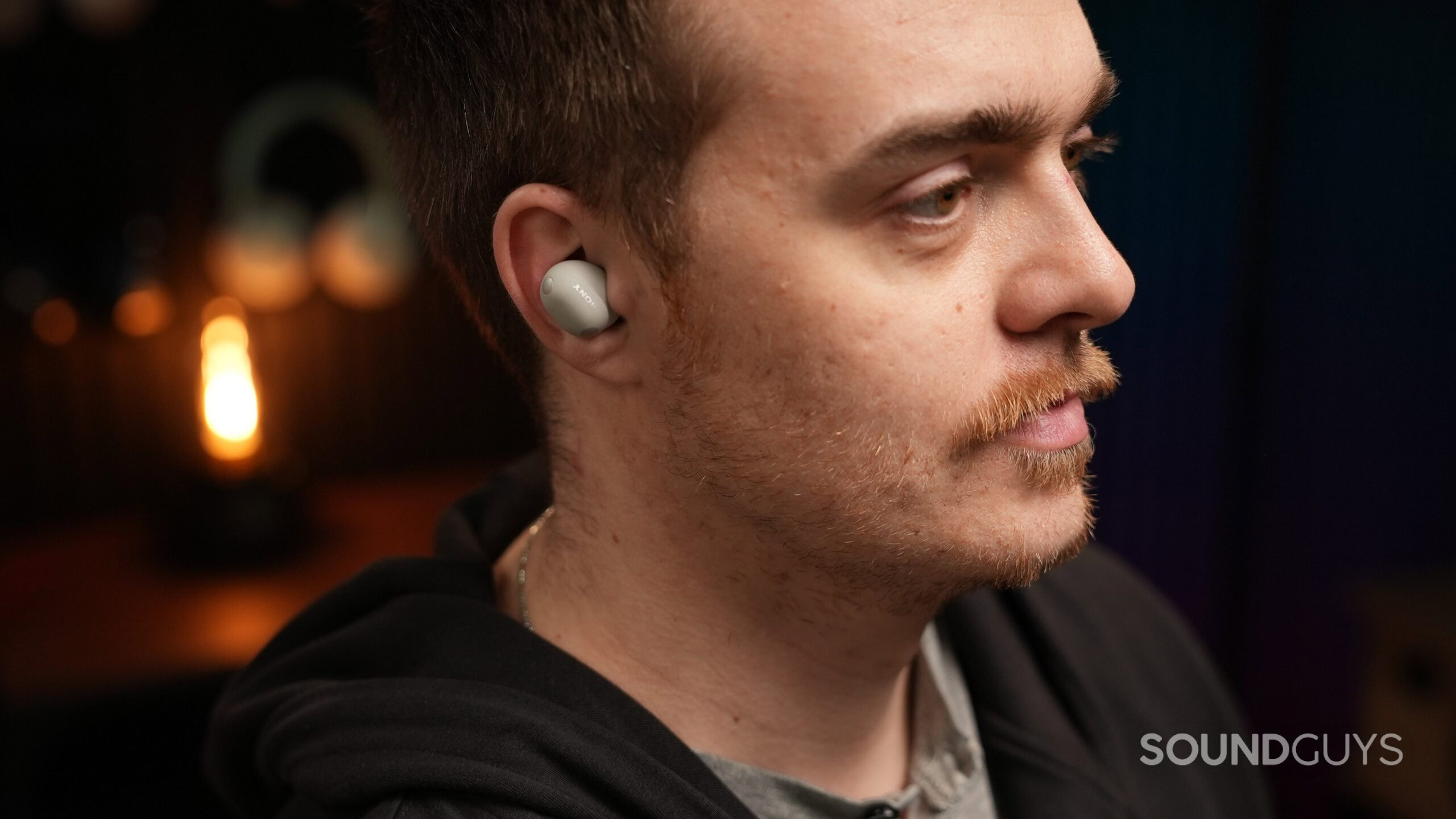 a man listening to the sony wf-1000xm6 earbuds