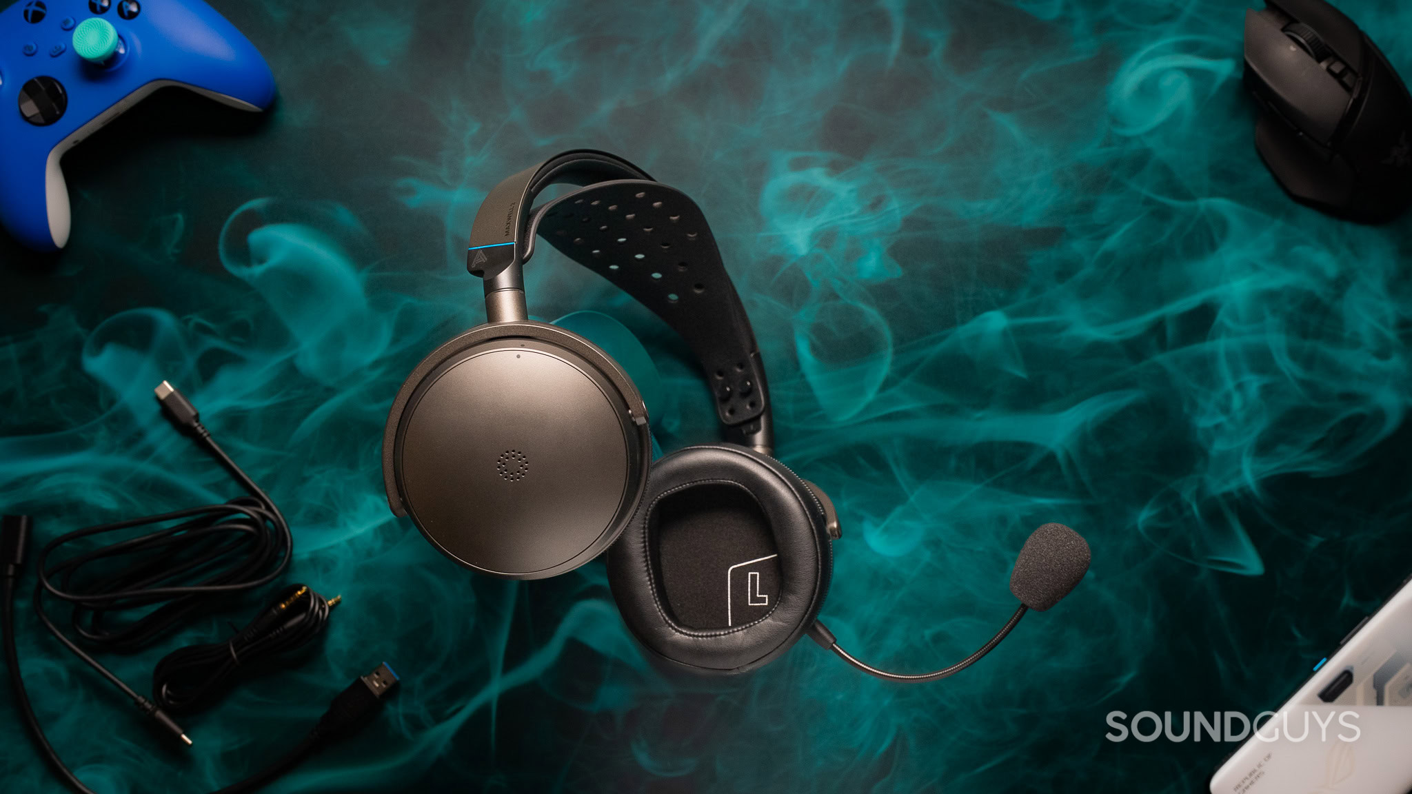 A photo of the Audeze Maxwell 2 sitting atop a cyan and black smoke-patterned countertop.
