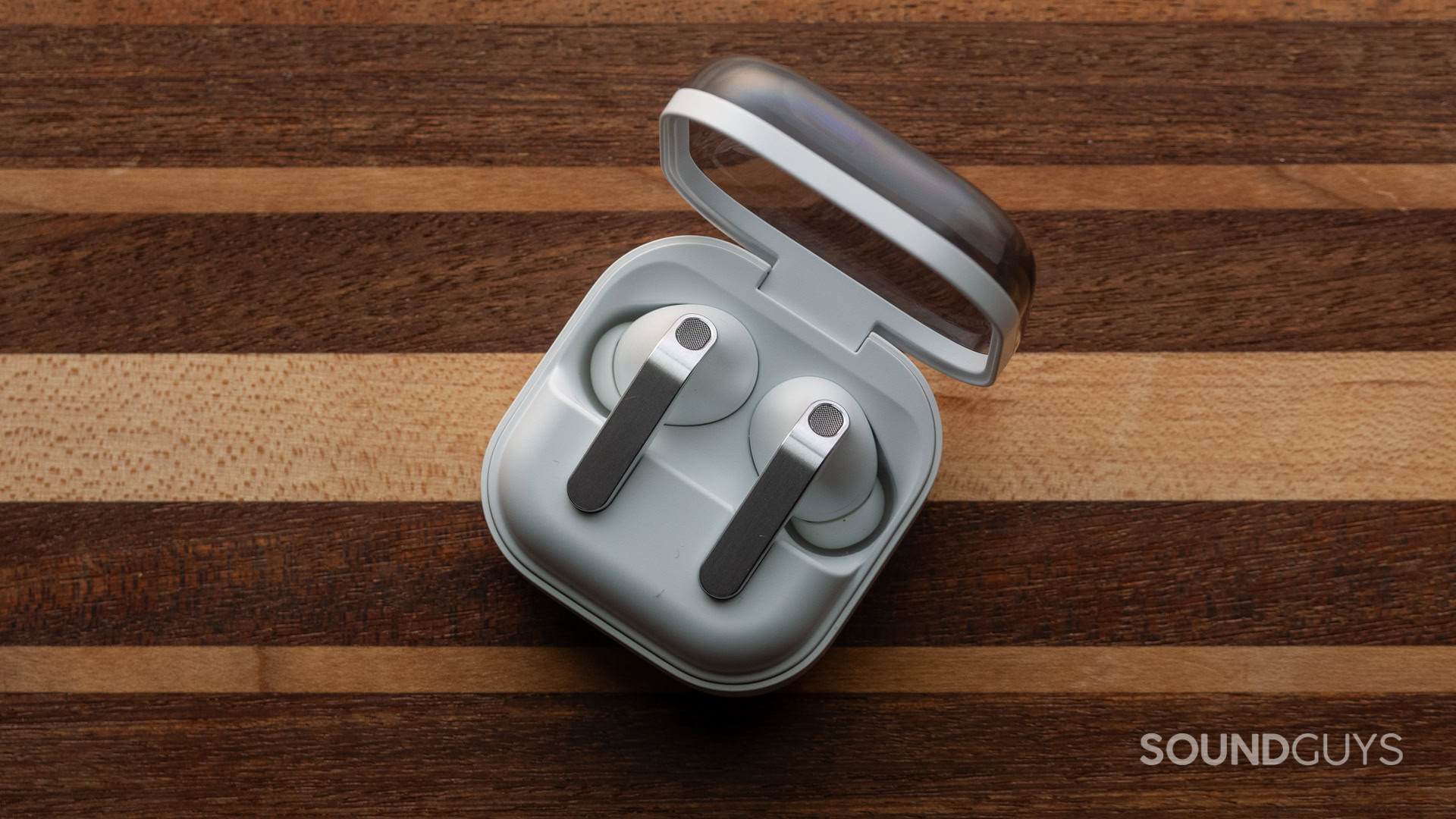 Samsung galaxy buds 4 pro002 Samsung galaxy buds 4 pro on wooden table
