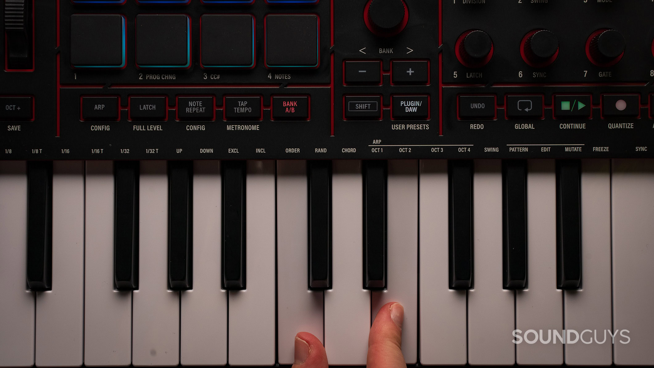 Akai MPK Mini IV playing keys.