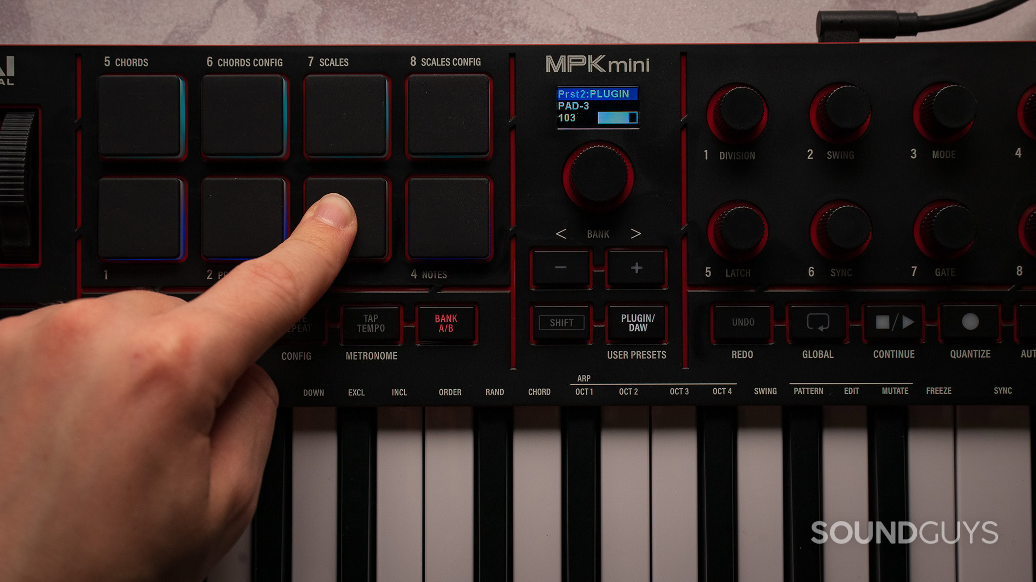 Akai MPK Mini IV performance pads and display.