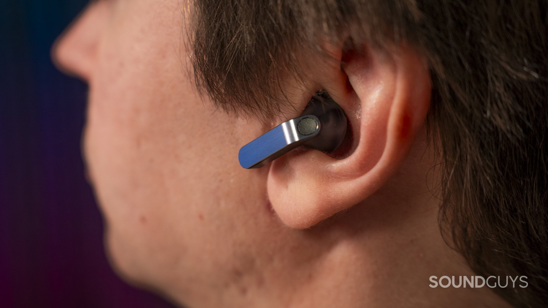 a man wearing the Samsung Galaxy Buds 4 earbuds