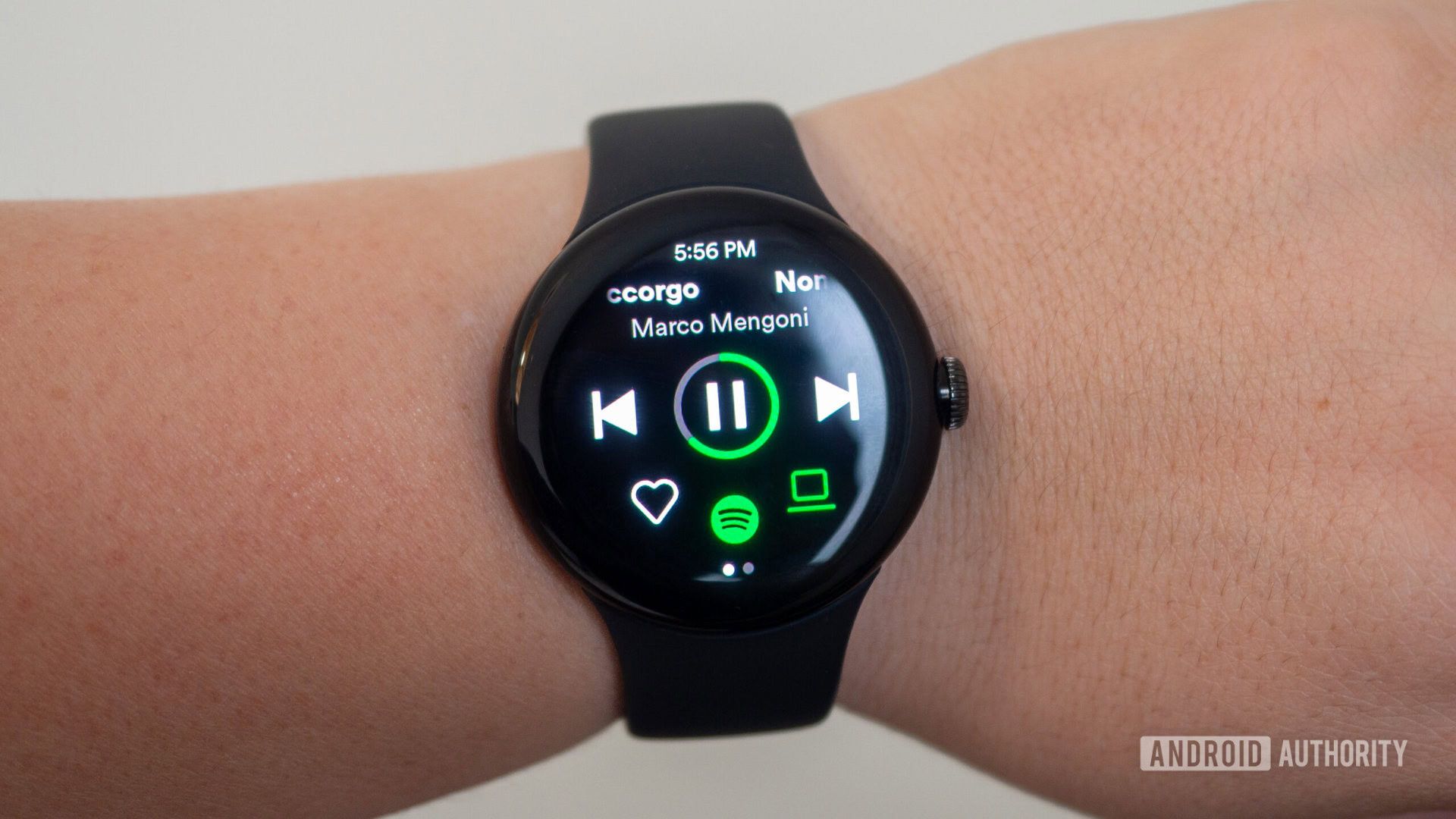 Spotify-smartwatch A screenshot of Spotify on a smartwatch.